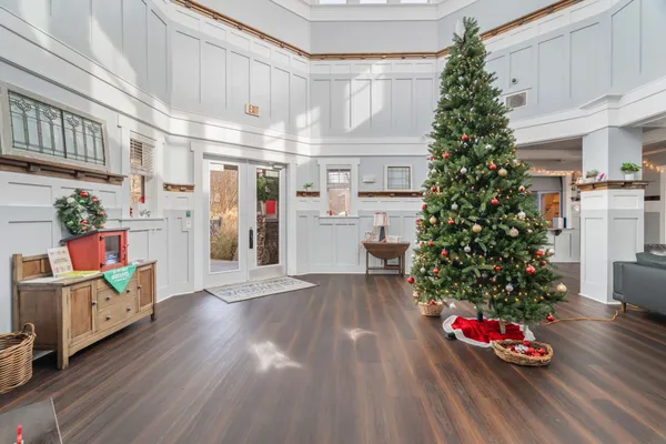 a room with furniture and wooden floor