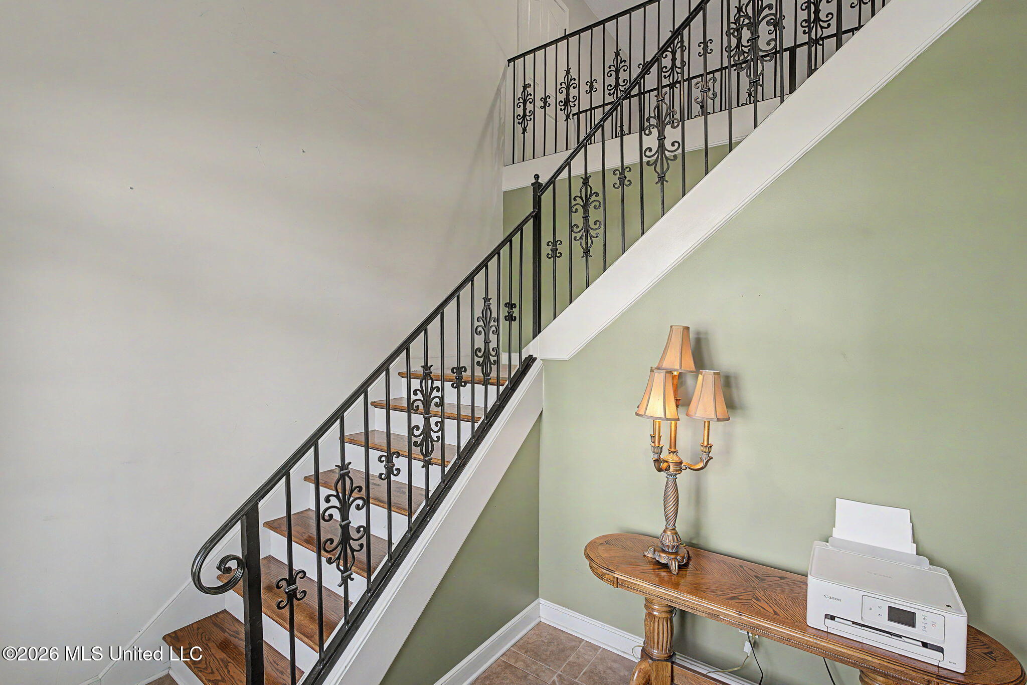 932 Gates Street Hernando, MS 38632 - Photo 29 of 54 Stairway with wrought iron railing!