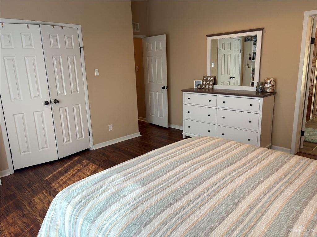 3078 Durango Street Mercedes, TX 78570 - Photo 20 of 41 a bedroom with a bed and a dresser