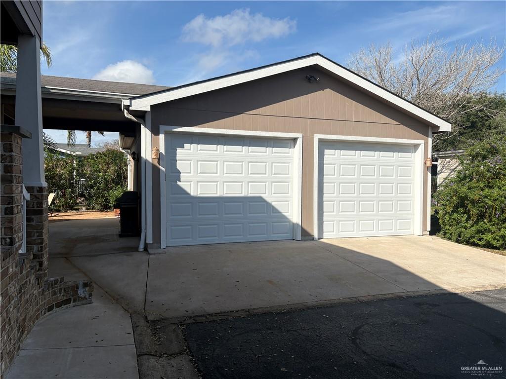 3078 Durango Street Mercedes, TX 78570 - Photo 3 of 41 a front view of a house with a yard