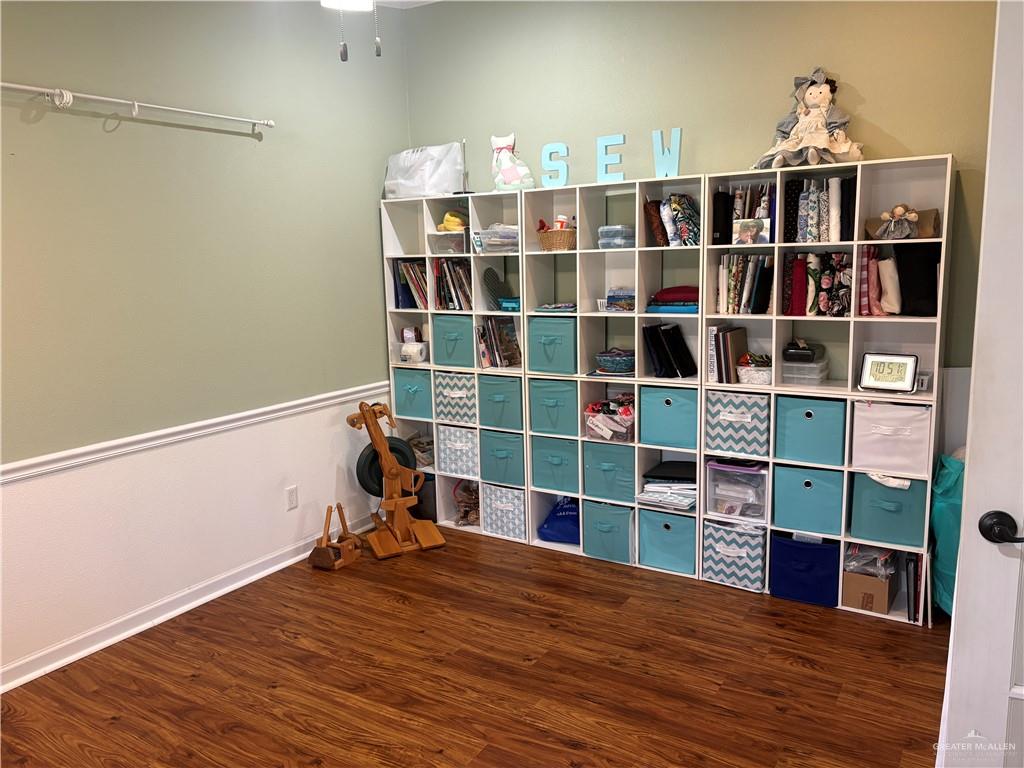 3078 Durango Street Mercedes, TX 78570 - Photo 32 of 41 a view of a room with wooden floor and closet