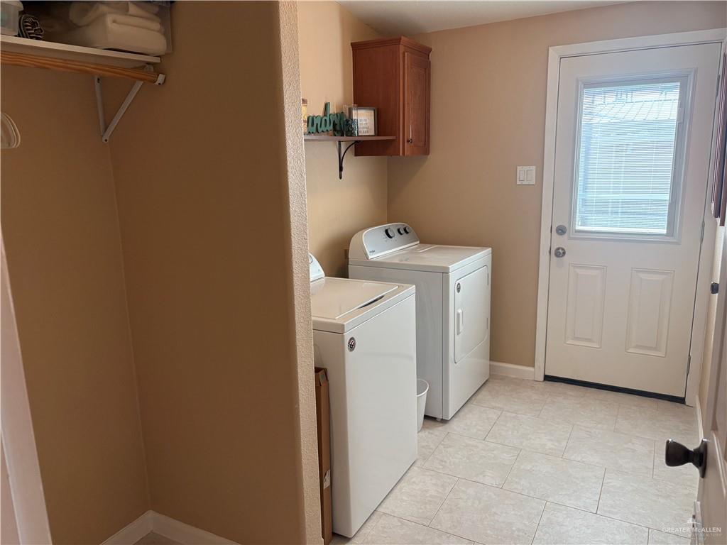 3078 Durango Street Mercedes, TX 78570 - Photo 39 of 41 a utility room with dryer and washer