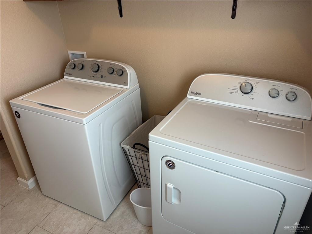 3078 Durango Street Mercedes, TX 78570 - Photo 40 of 41 a utility room with dryer and washer