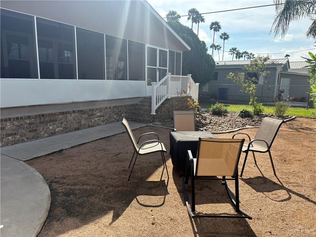 3078 Durango Street Mercedes, TX 78570 - Photo 6 of 41 a view of a room that has a table and chairs in it