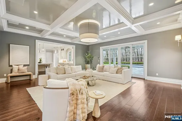 a spacious bathroom with a granite countertop sink mirror and a