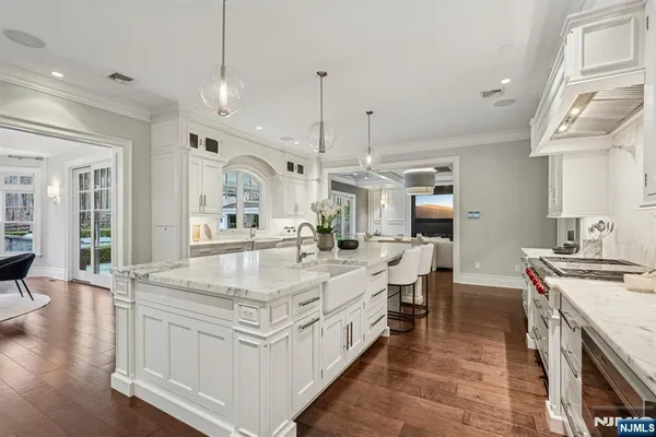 a view of swimming pool with outdoor seating and plants