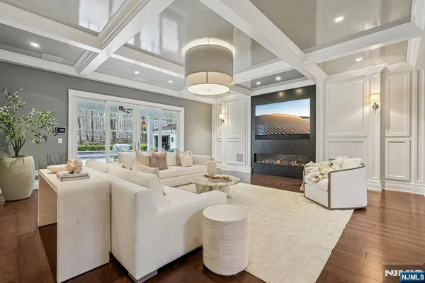 a spacious bathroom with a double vanity sink a mirror and a bathtub