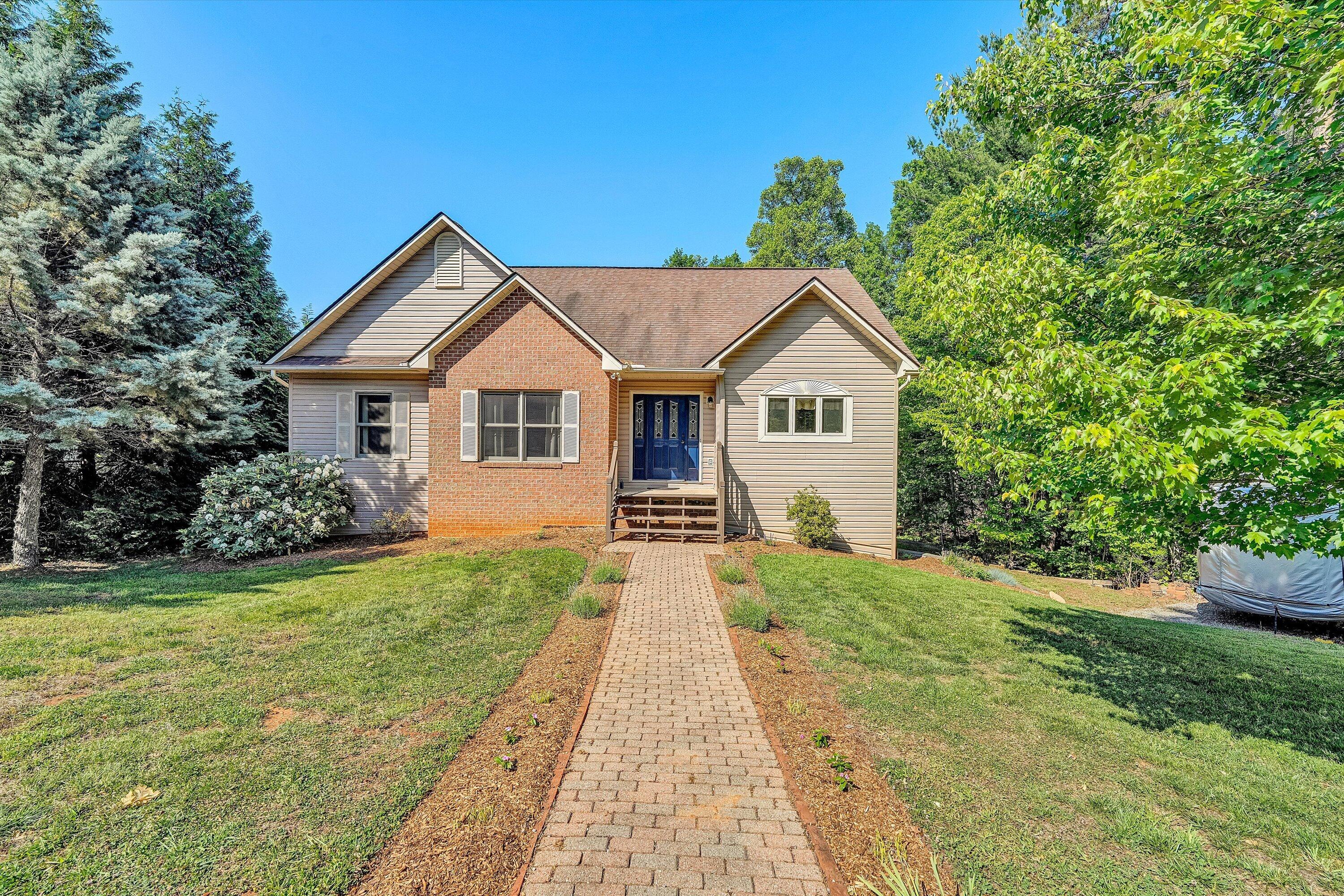 400 Harbor Moneta, VA 24121 - Photo 4 of 51 a front view of a house with yard