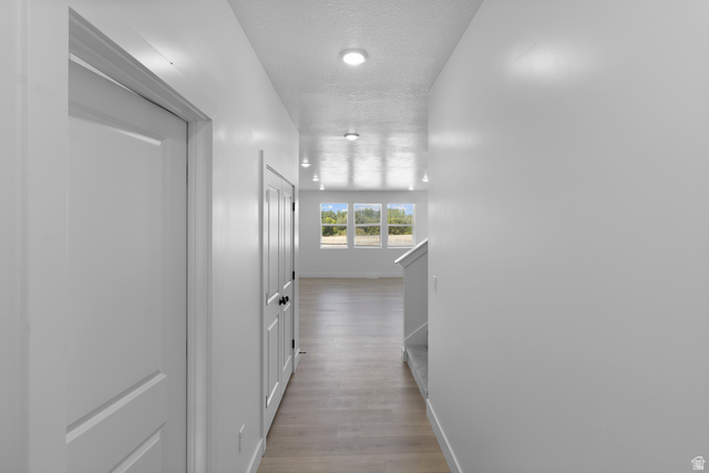 2840 West Aurora Avenue Mapleton, UT 84664 - Photo 2 of 14 Recessed lighting illuminates wood-finish flooring