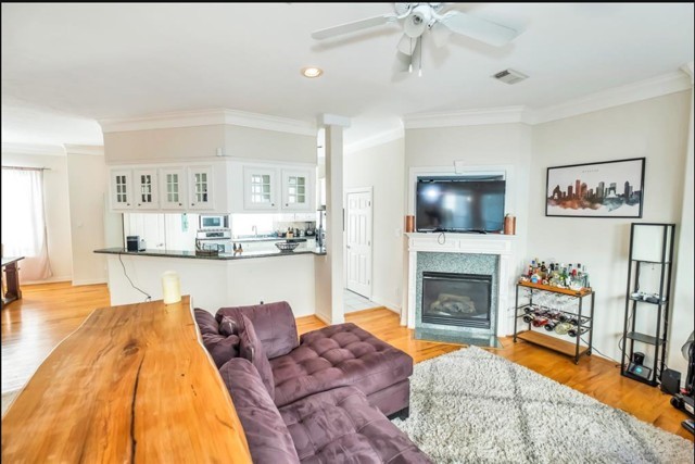 3011 Houston Avenue, Unit B Houston, TX 77009 - Photo 11 of 24 a living room with furniture and a fireplace