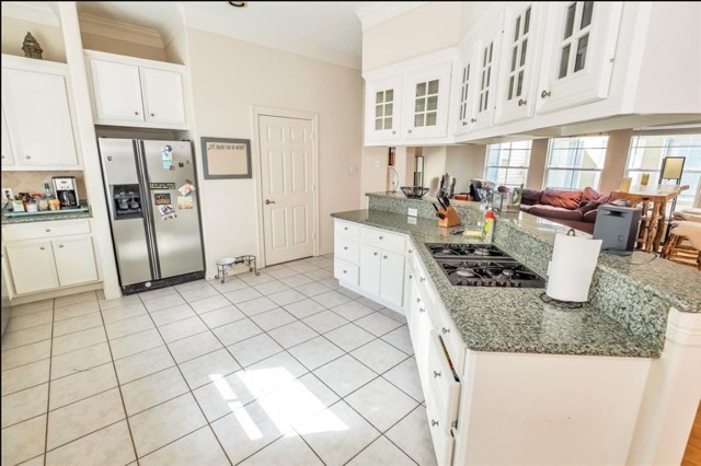 3011 Houston Avenue, Unit B Houston, TX 77009 - Photo 14 of 24 a kitchen with stainless steel appliances granite countertop a sink stove and cabinets