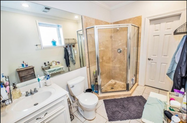 3011 Houston Avenue, Unit B Houston, TX 77009 - Photo 6 of 24 a bathroom with a sink toilet and shower