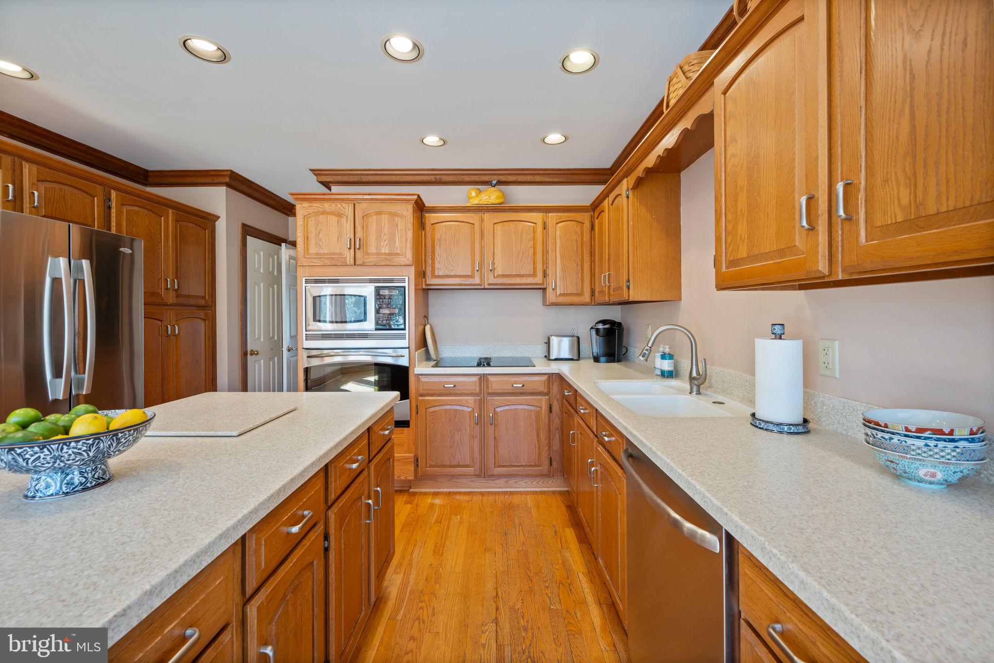12 Sparks Station Road Sparks Glencoe, MD 21152 - Photo 16 of 57 a kitchen with stainless steel appliances granite countertop a sink and cabinets