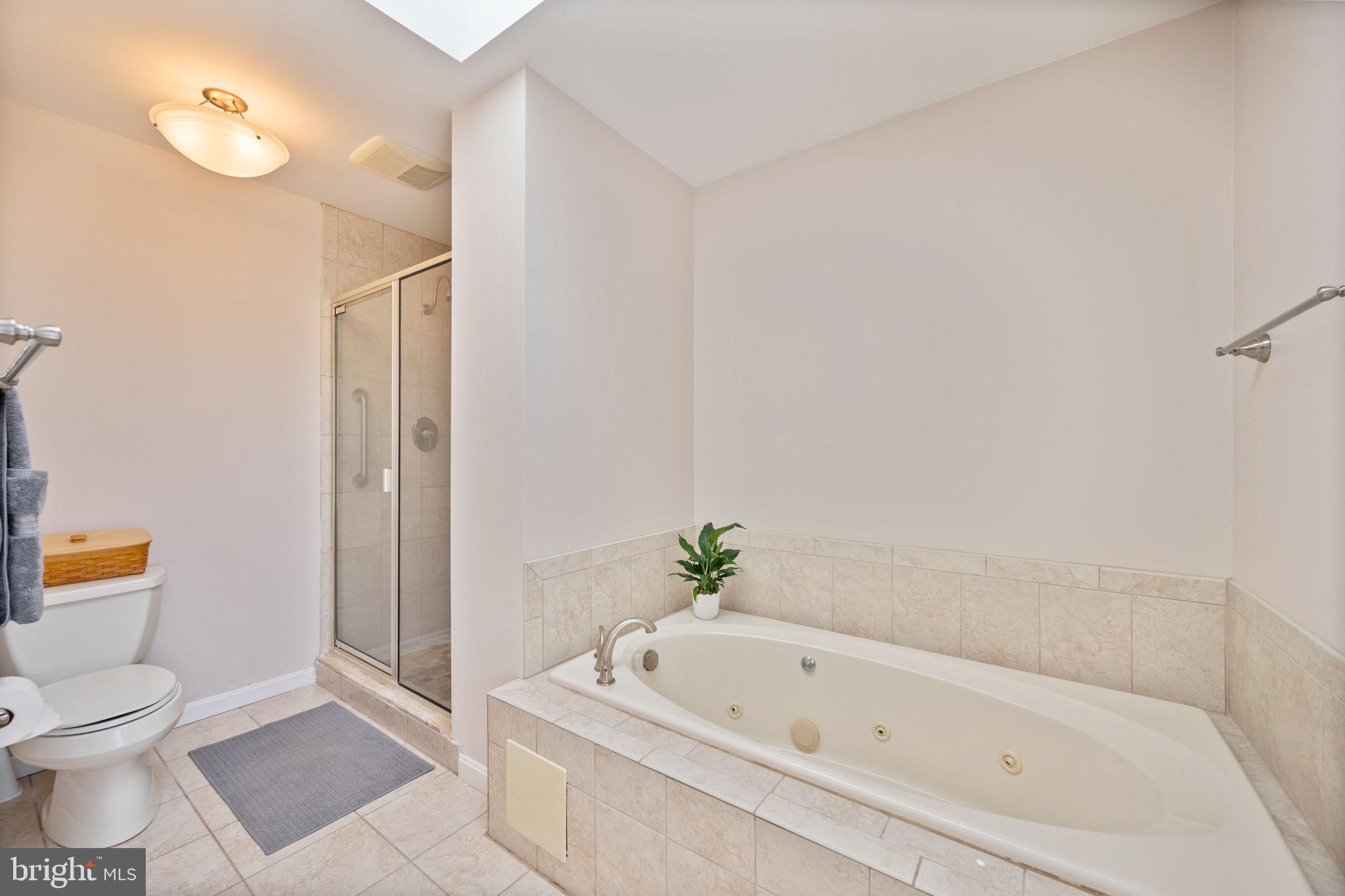 12 Sparks Station Road Sparks Glencoe, MD 21152 - Photo 29 of 57 a white bath tub sitting next to a white toilet