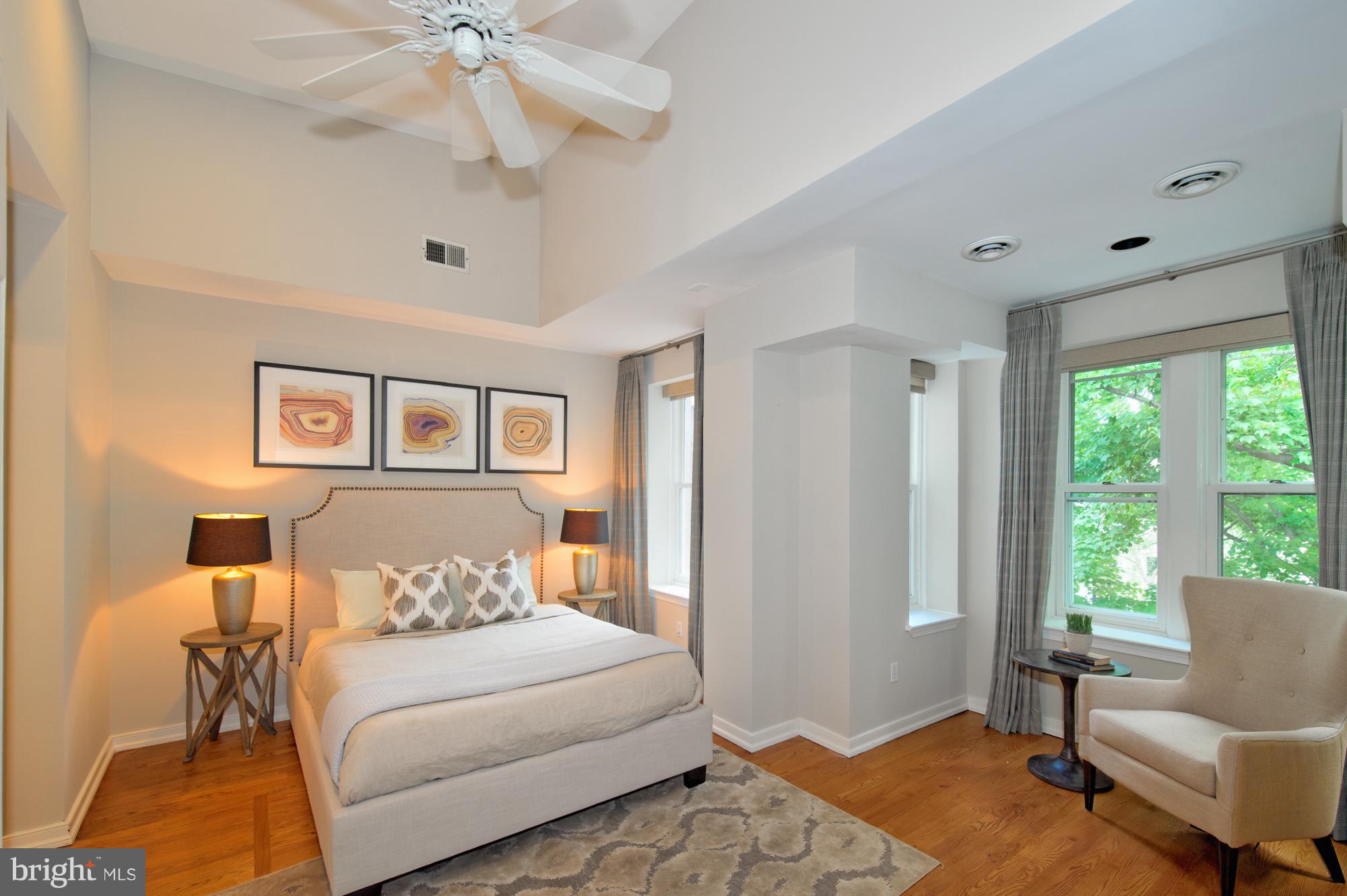 238 10th Street Northeast Washington, DC 20002 - Photo 16 of 30 a bedroom with furniture and a window