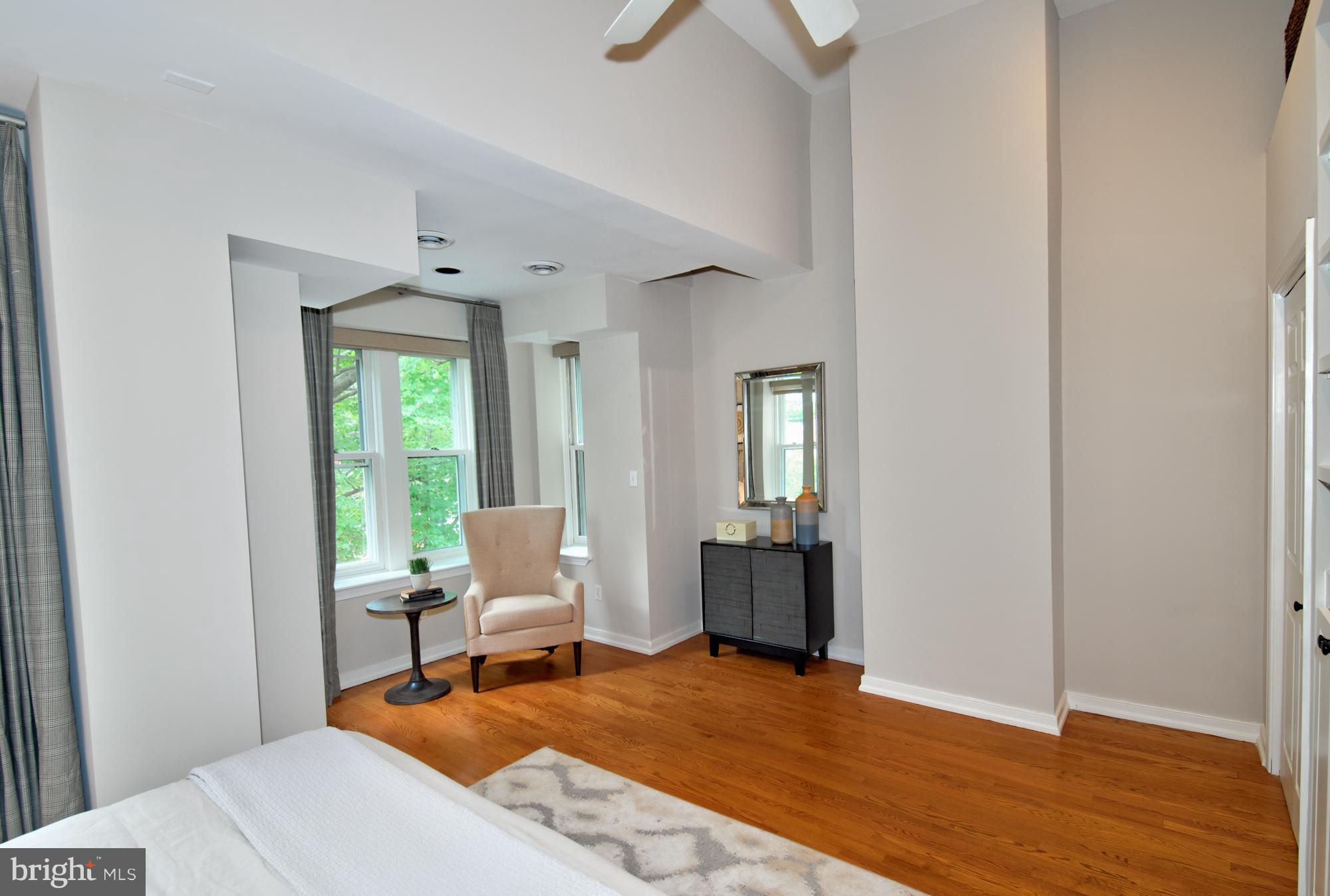238 10th Street Northeast Washington, DC 20002 - Photo 18 of 30 a living room with furniture and a window
