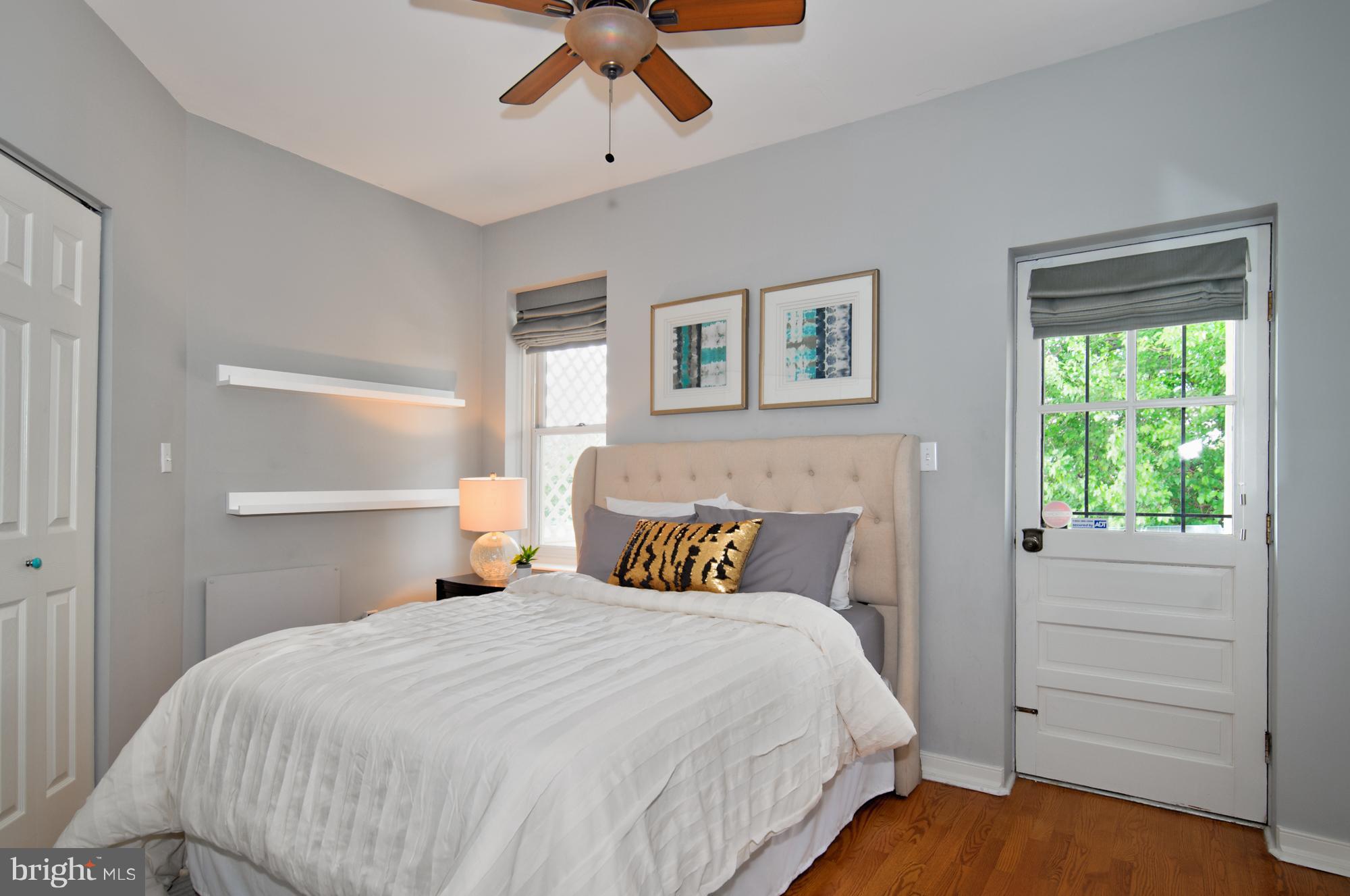 238 10th Street Northeast Washington, DC 20002 - Photo 24 of 30 a bedroom with a large bed and a window
