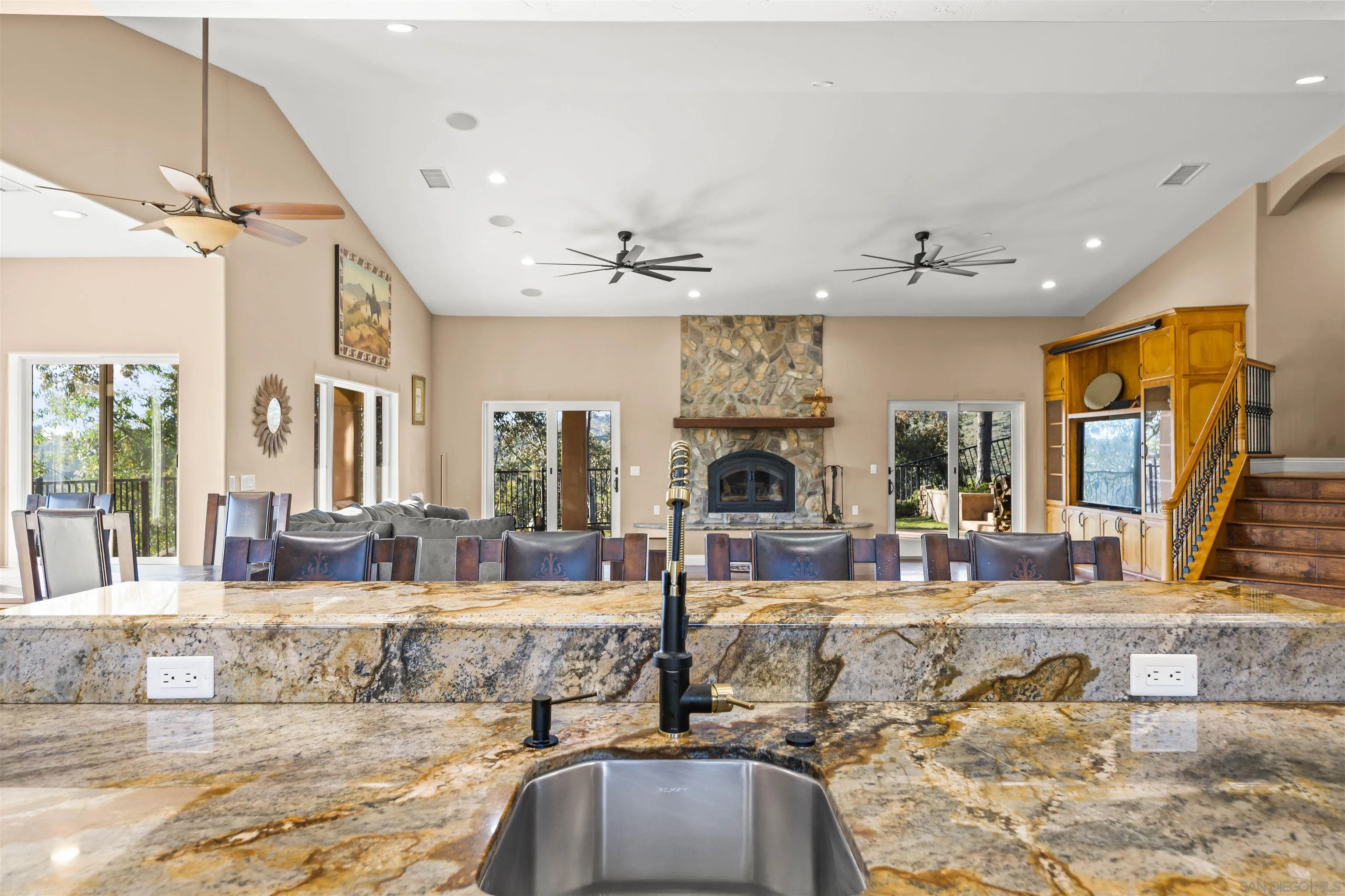 16951 Old Coach Road Poway, CA 92064 - Photo 15 of 70 a living room with fireplace furniture and a large window