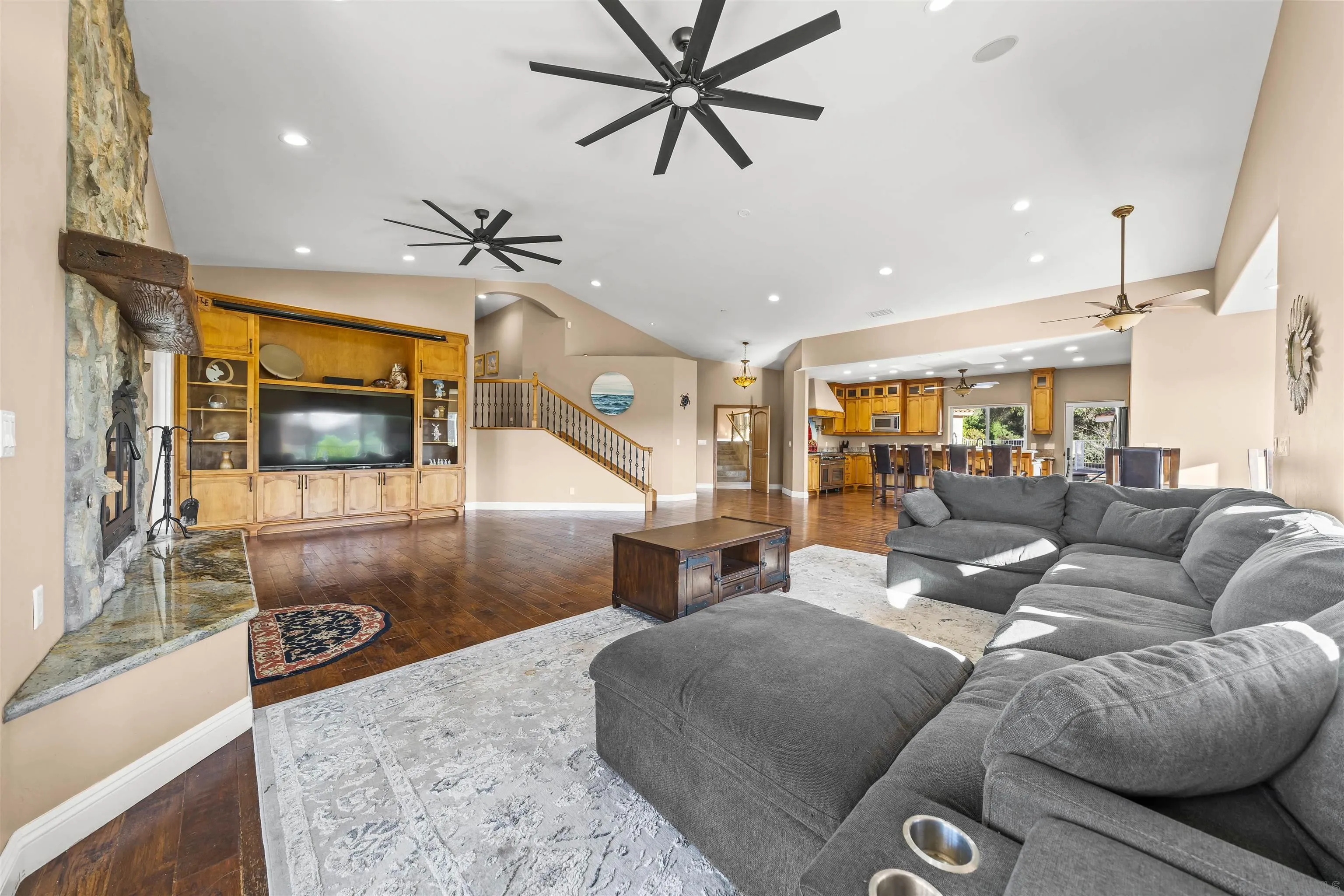 16951 Old Coach Road Poway, CA 92064 - Photo 20 of 70 a living room with furniture and a flat screen tv