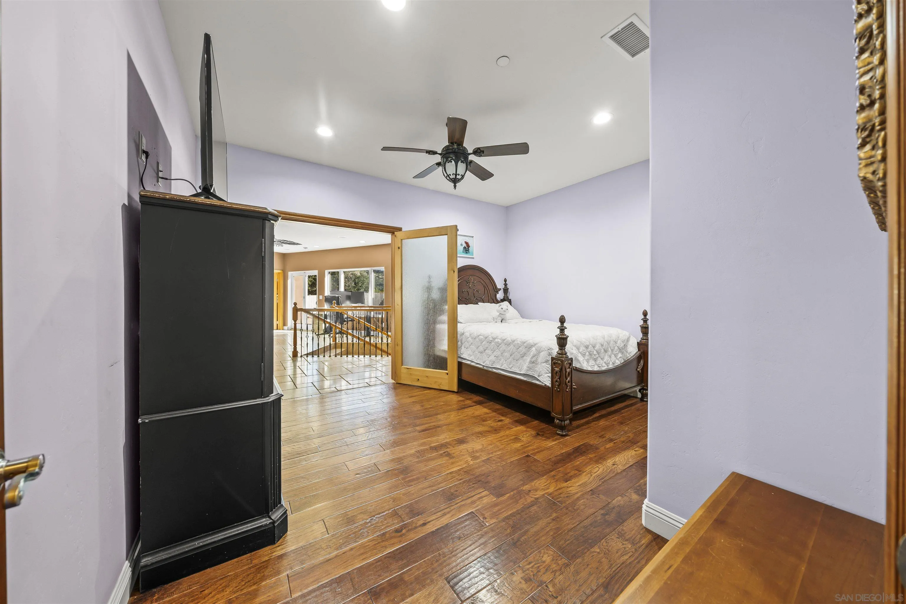 16951 Old Coach Road Poway, CA 92064 - Photo 40 of 70 a living room with furniture and a ceiling fan