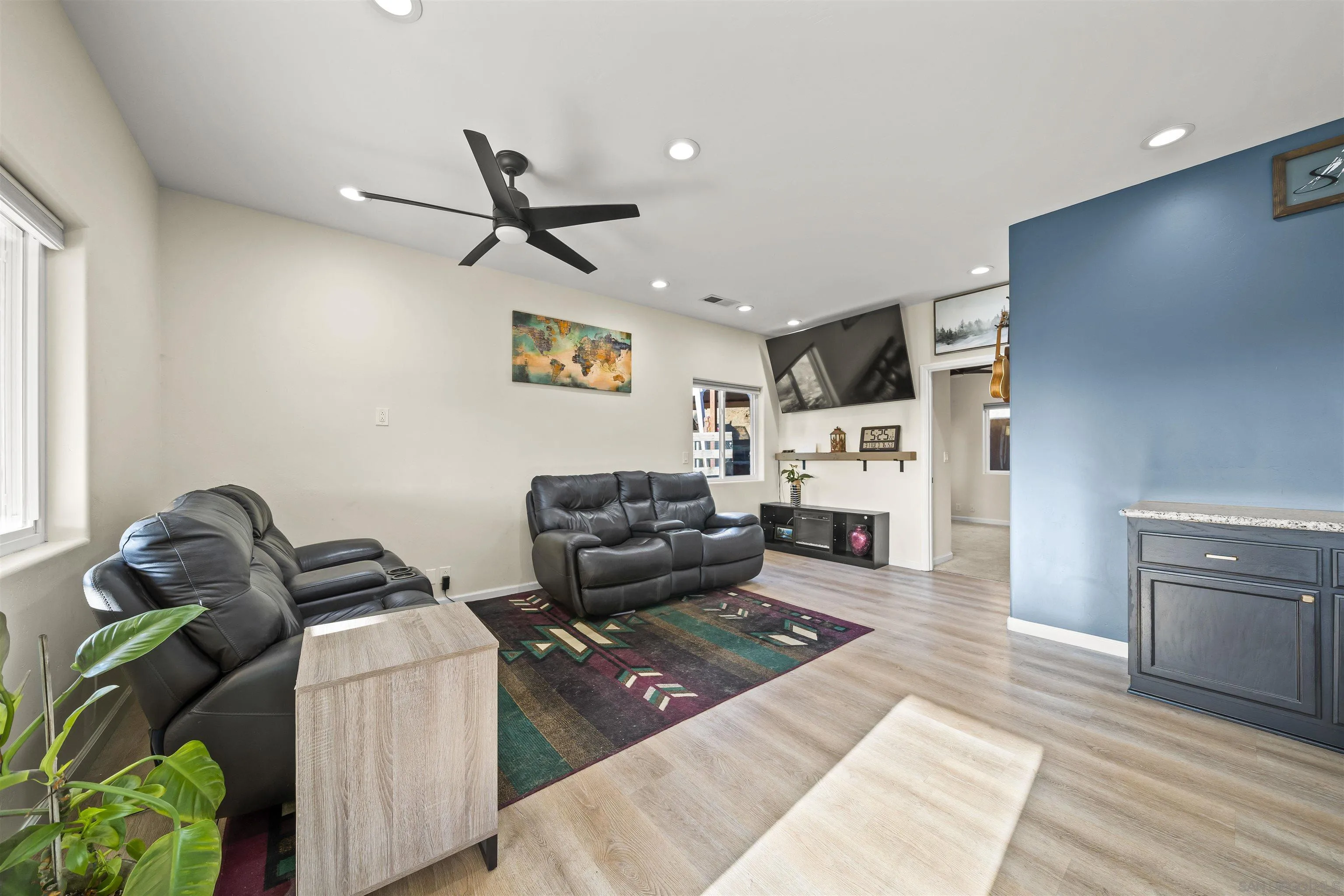 16951 Old Coach Road Poway, CA 92064 - Photo 52 of 70 a living room with furniture and a flat screen tv