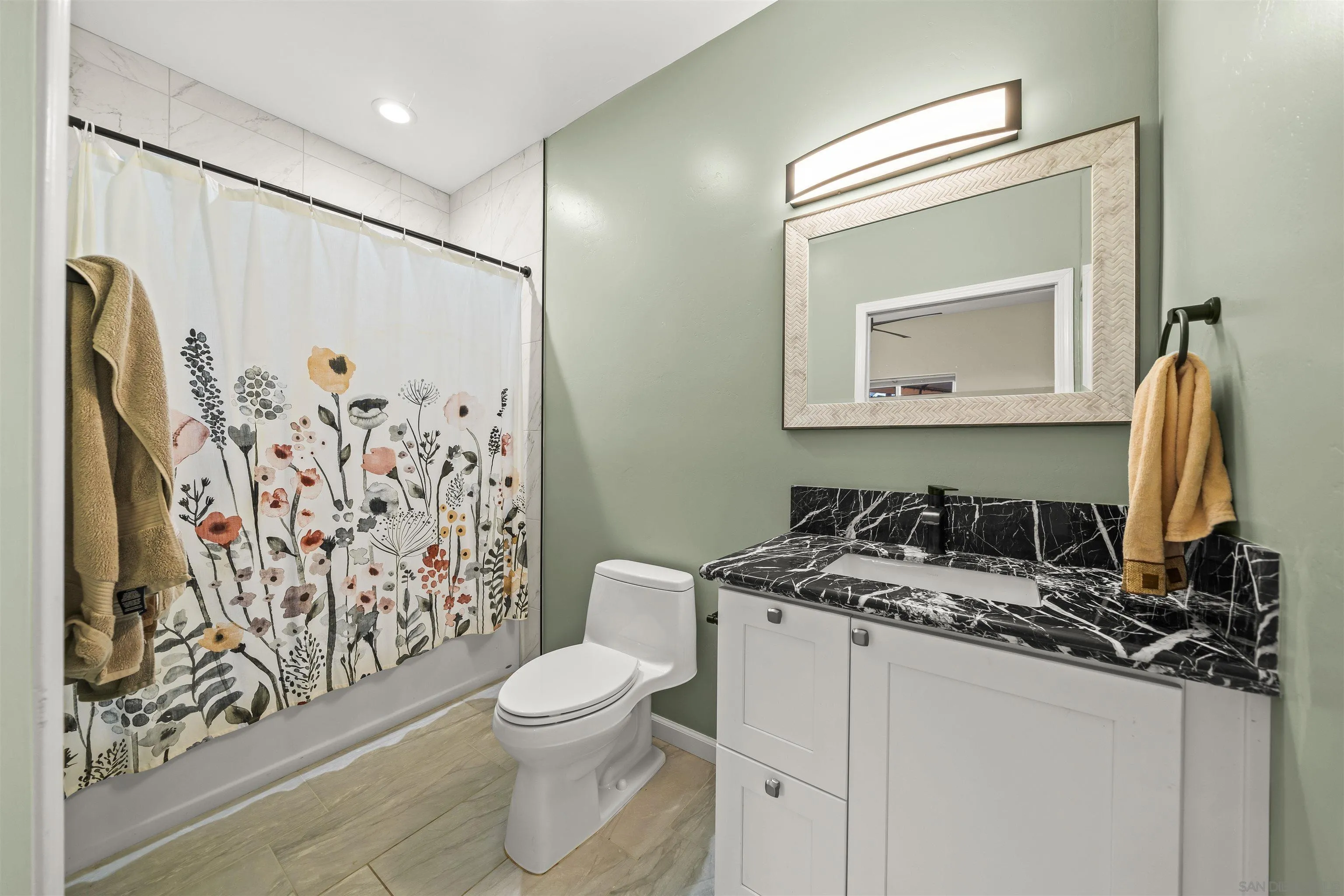 16951 Old Coach Road Poway, CA 92064 - Photo 58 of 70 a bathroom with a granite countertop sink toilet and mirror