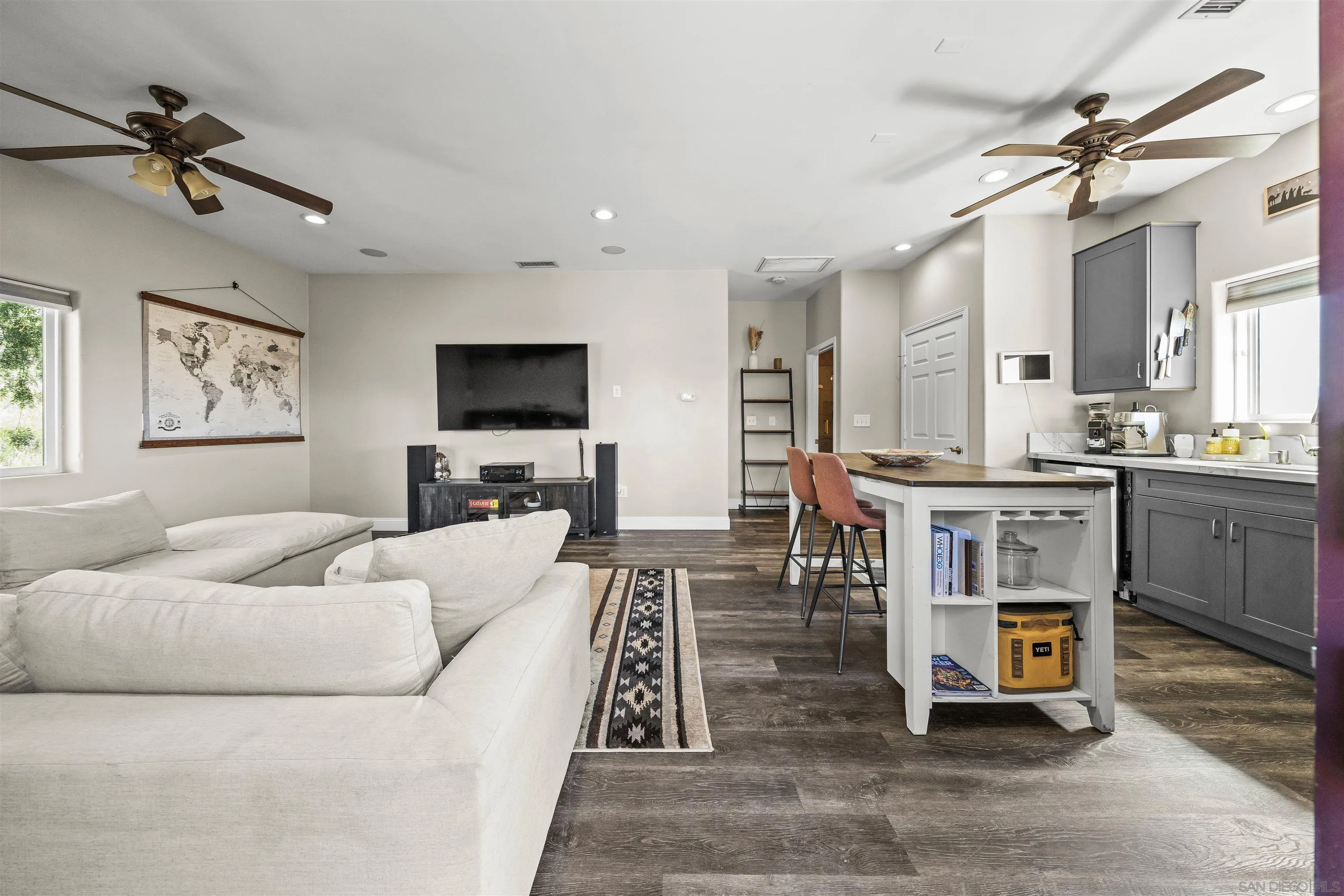16951 Old Coach Road Poway, CA 92064 - Photo 63 of 70 a living room with furniture and a flat screen tv