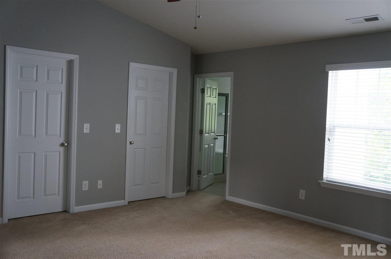 11954 Field Towne Lane Raleigh, NC 27614 - Photo 12 of 16 Master Bedroom With His and Hers Walk-In Closets and Master Bathroom
