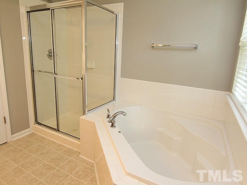 11954 Field Towne Lane Raleigh, NC 27614 - Photo 13 of 16 Master Bathroom With Garden Tub and Separate Shower