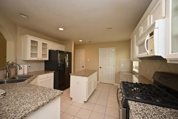 $2,450 | 219 North Wimberly Way, The Woodlands, TX 77385