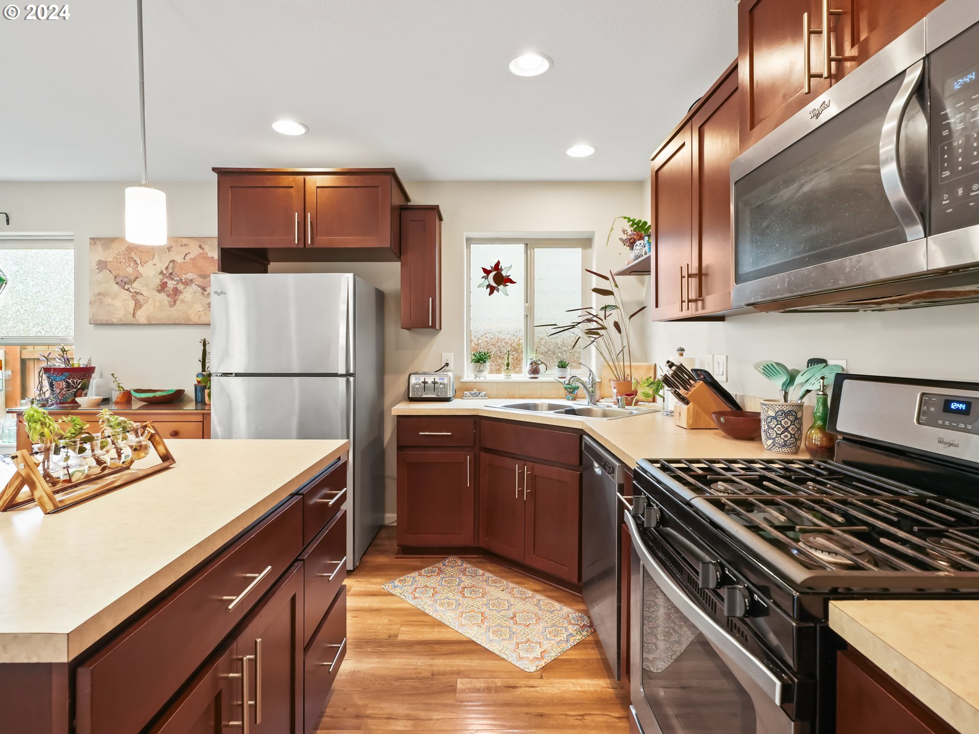 35 North 42nd Place Ridgefield, WA 98642 - Photo 11 of 31 a kitchen with a refrigerator and a sink