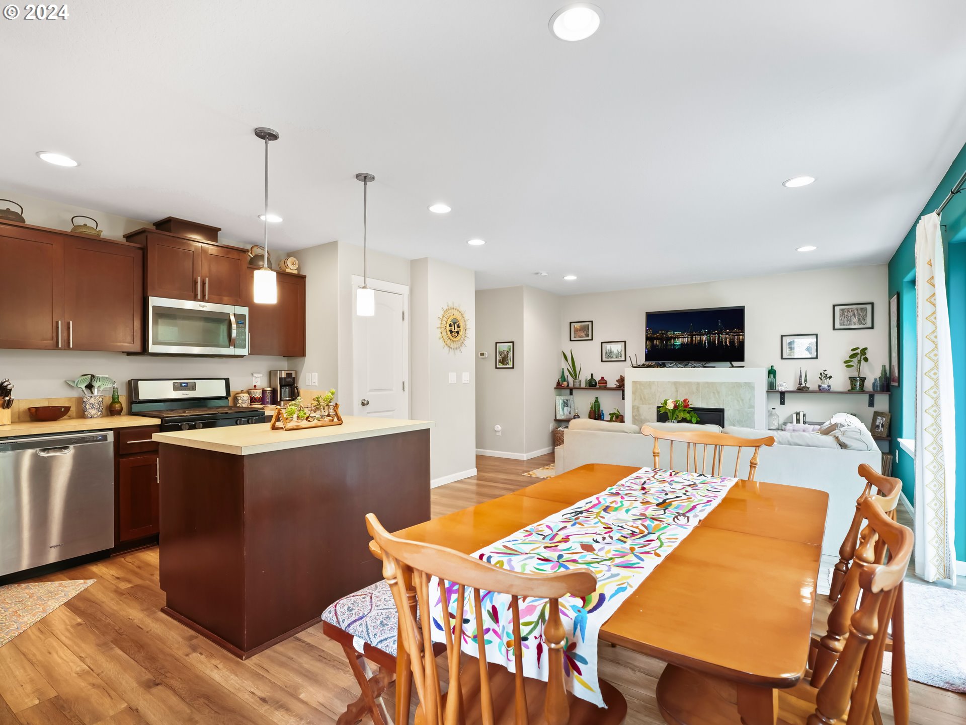 35 North 42nd Place Ridgefield, WA 98642 - Photo 12 of 31 a large kitchen with kitchen island a sink table and chairs