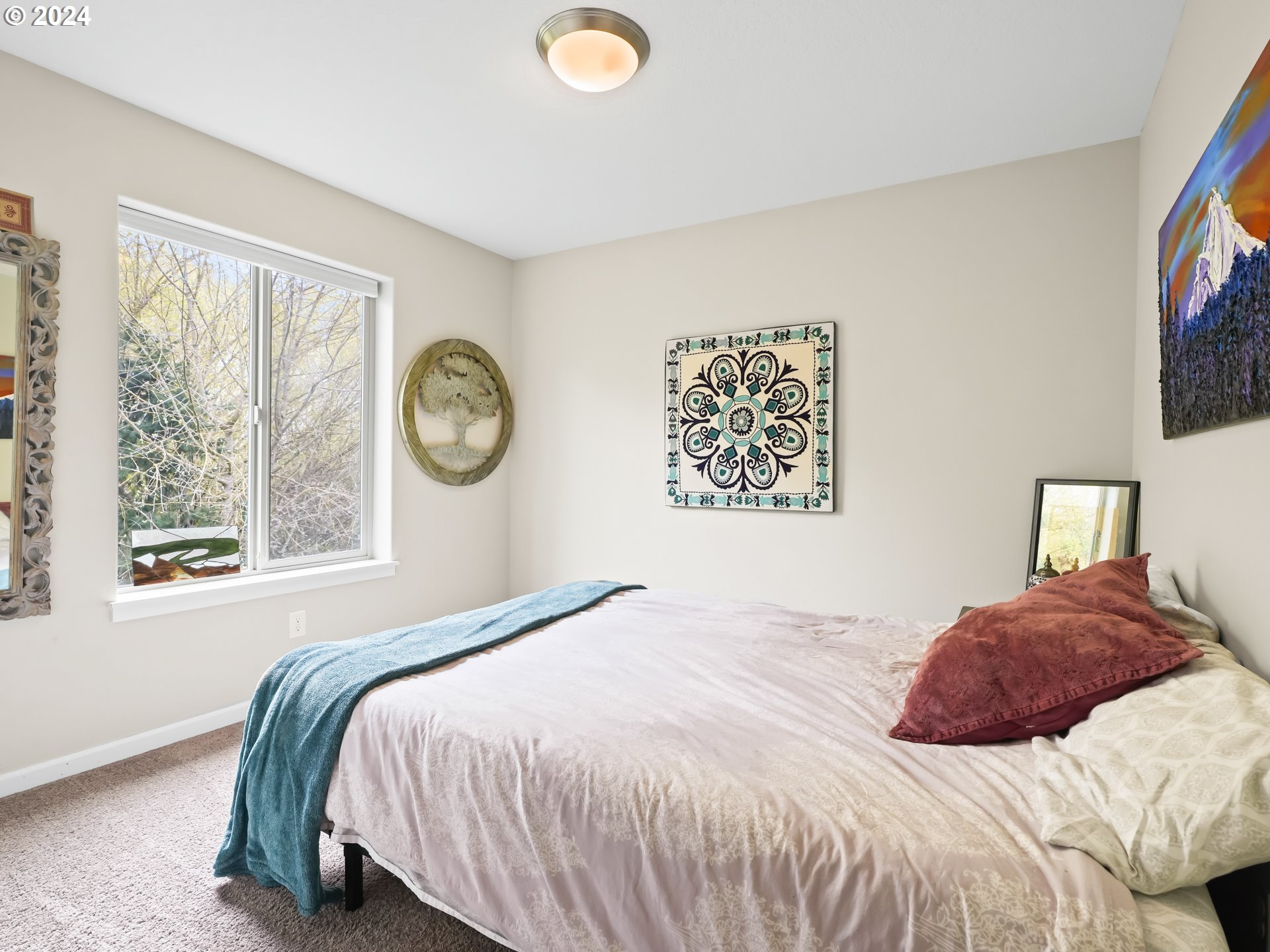 35 North 42nd Place Ridgefield, WA 98642 - Photo 16 of 31 a bedroom with a bed and a large window