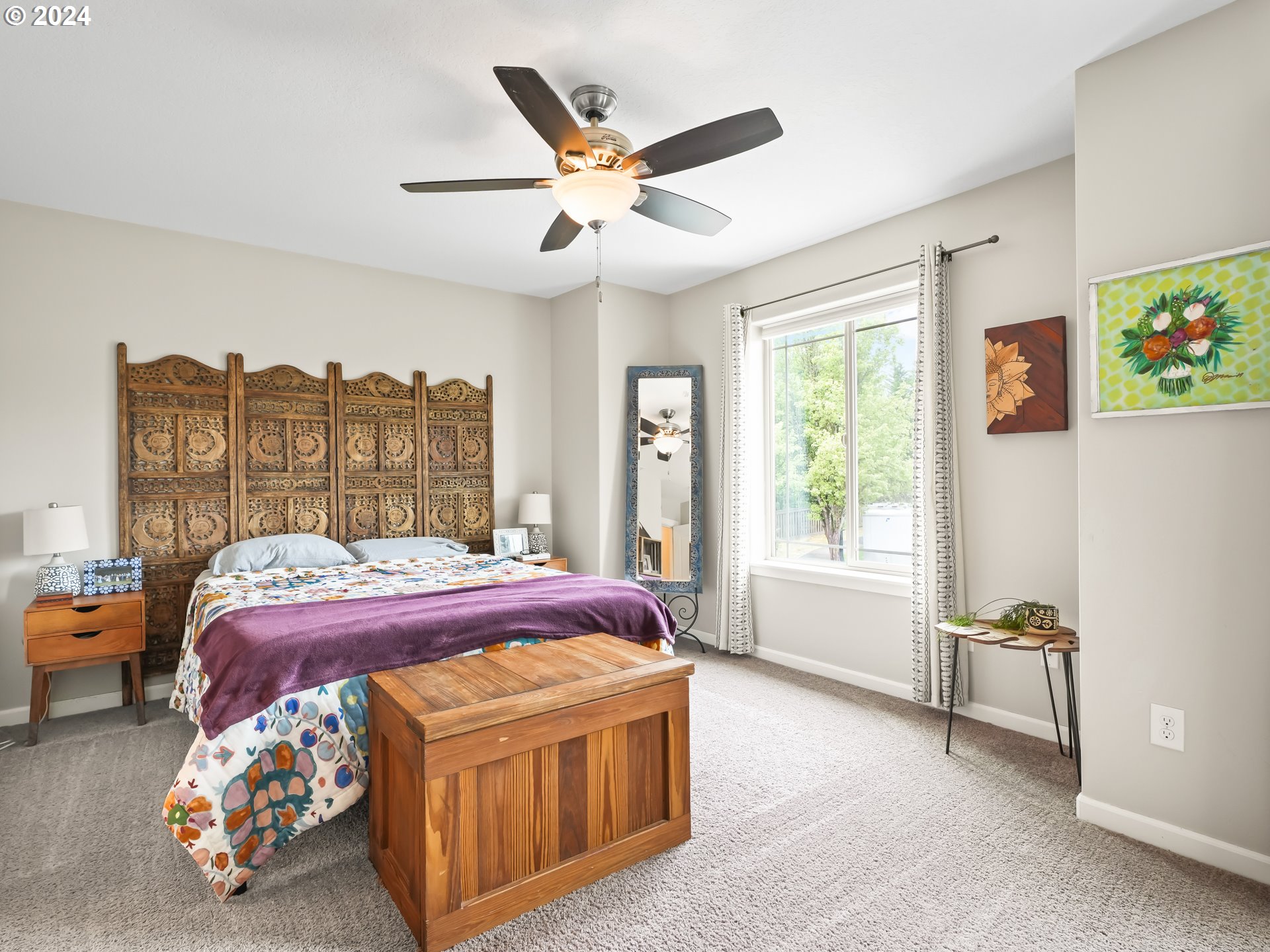 35 North 42nd Place Ridgefield, WA 98642 - Photo 21 of 31 a bedroom with a bed and a large window