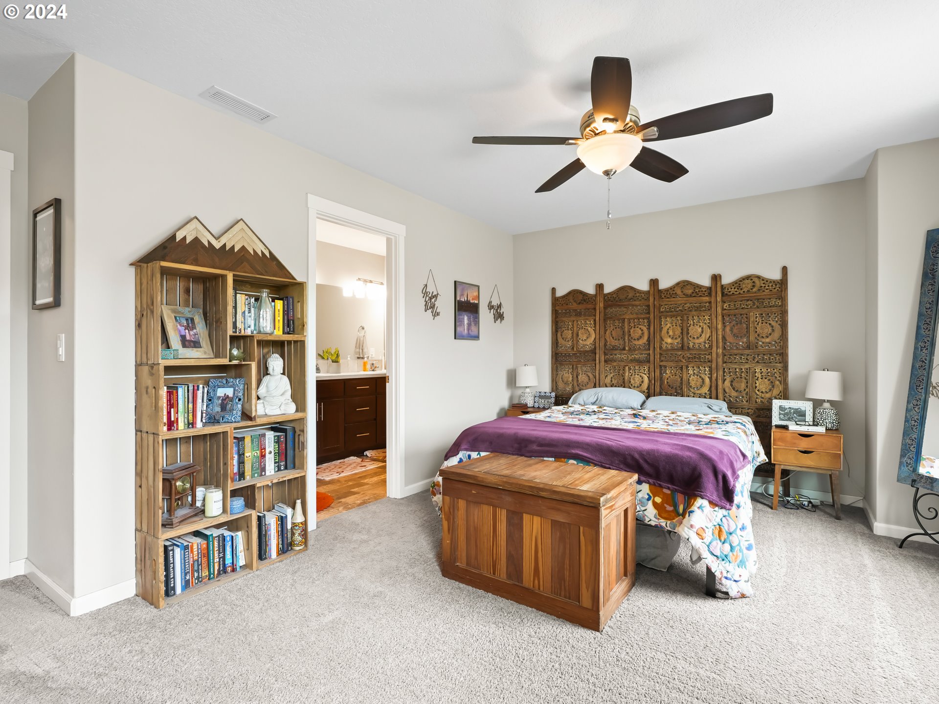 35 North 42nd Place Ridgefield, WA 98642 - Photo 22 of 31 a bed room with a bed and a book shelf