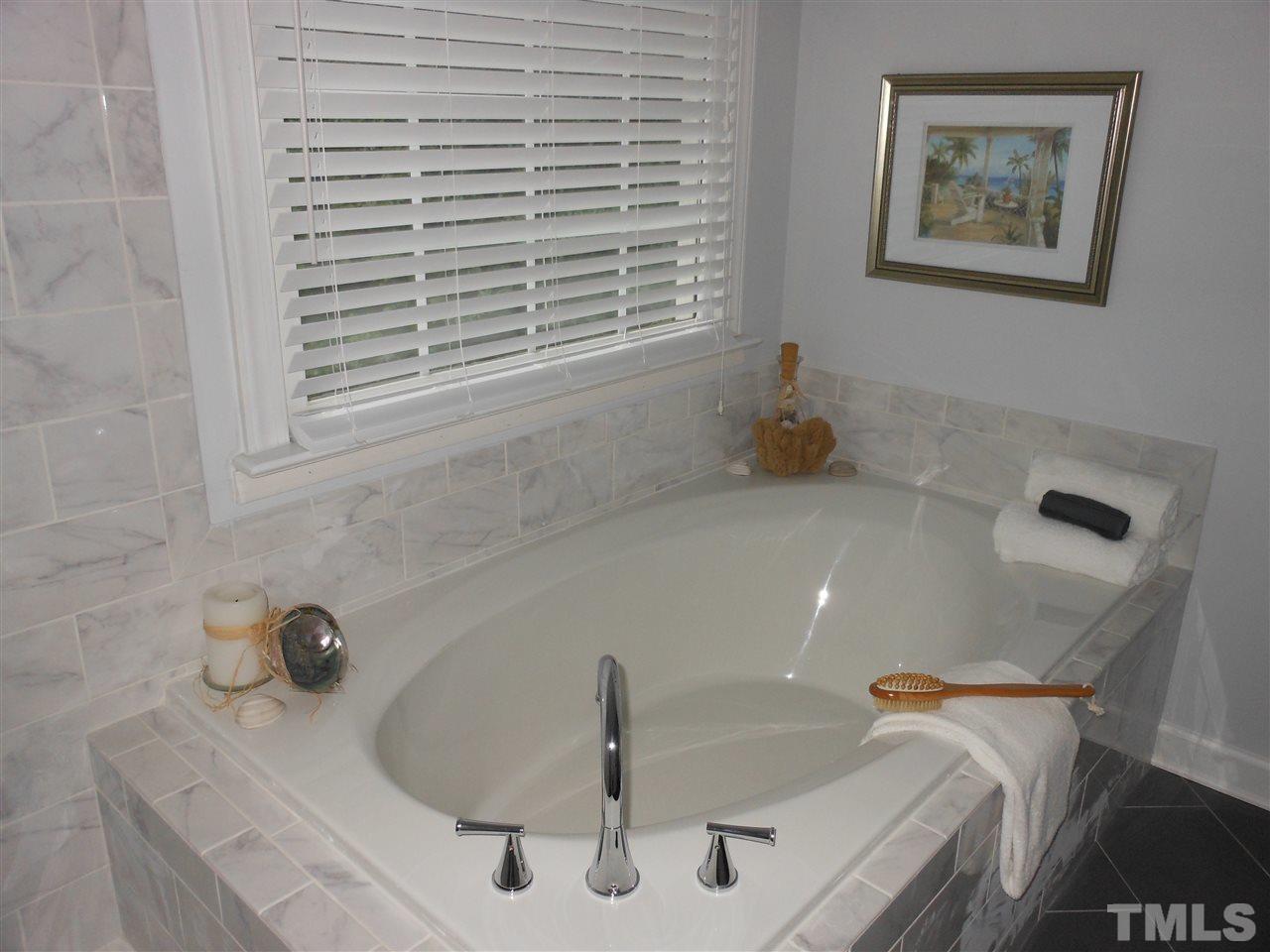 8409 Yucca Trail Raleigh, NC 27615 - Photo 15 of 25 a bathroom with a sink