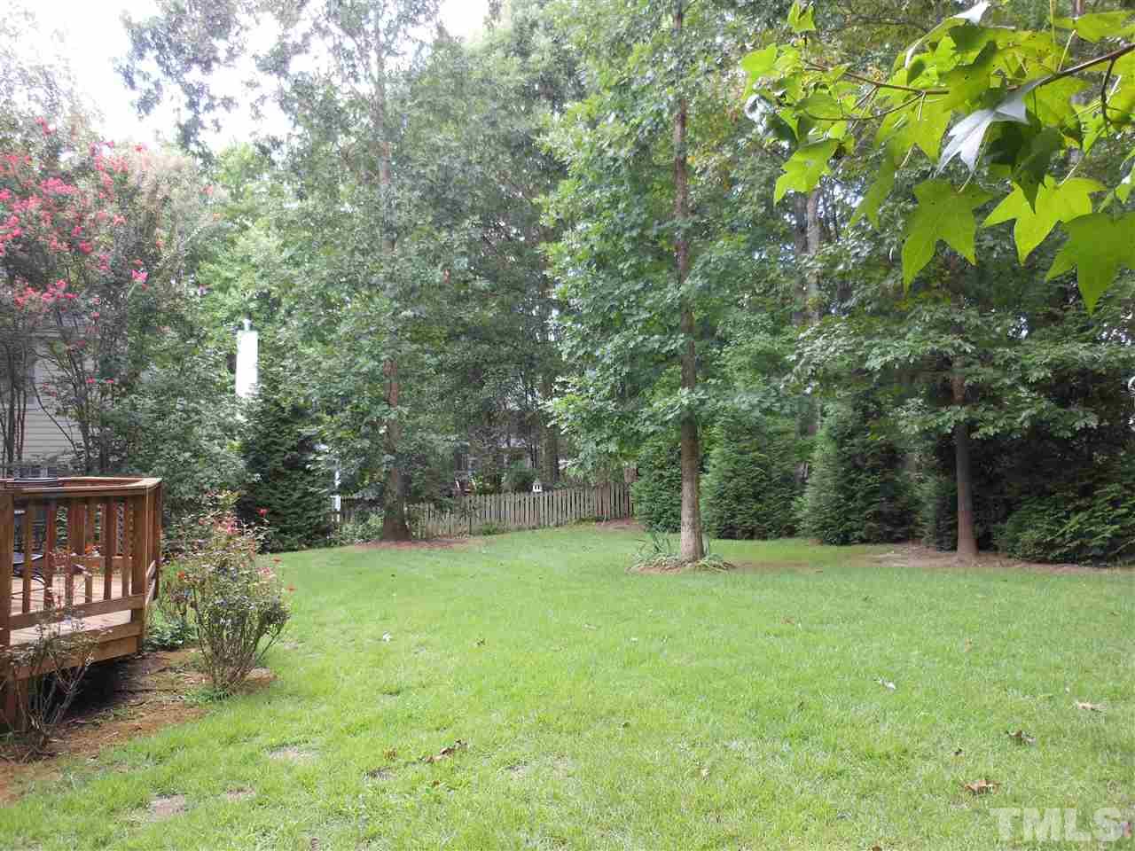 8409 Yucca Trail Raleigh, NC 27615 - Photo 23 of 25 a view of an outdoor space and a yard