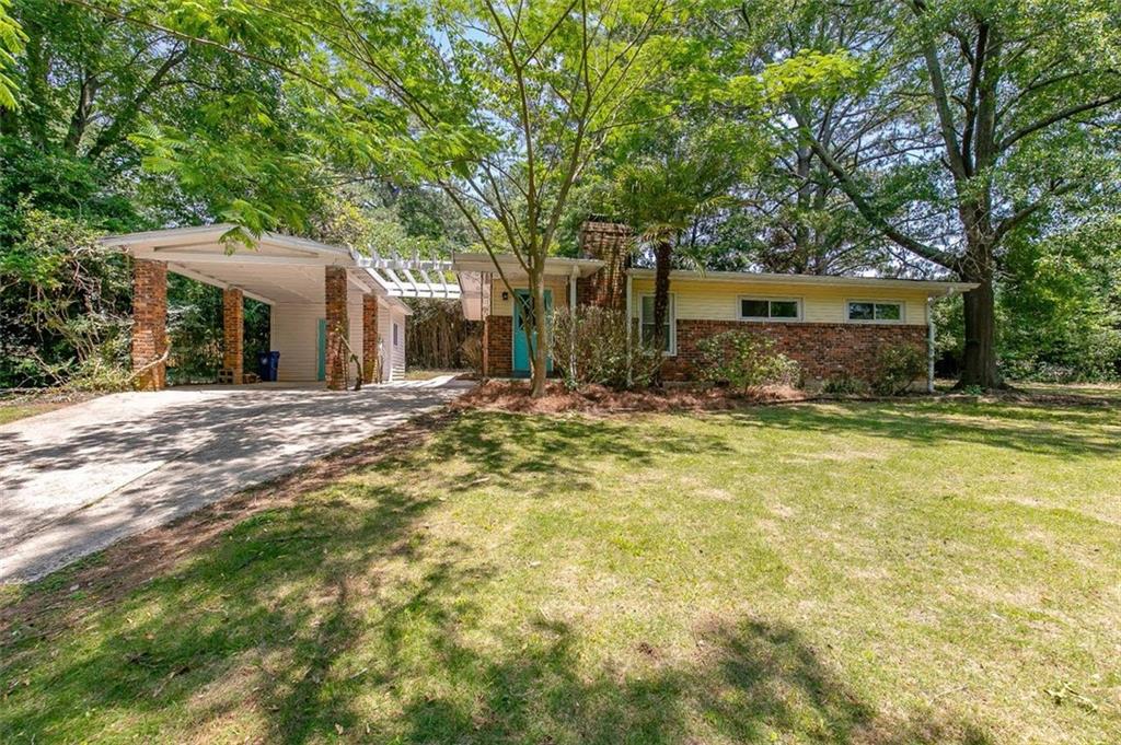 3014 Wilson Road Decatur, GA 30033 - Photo 1 of 1 a front view of a house with a yard
