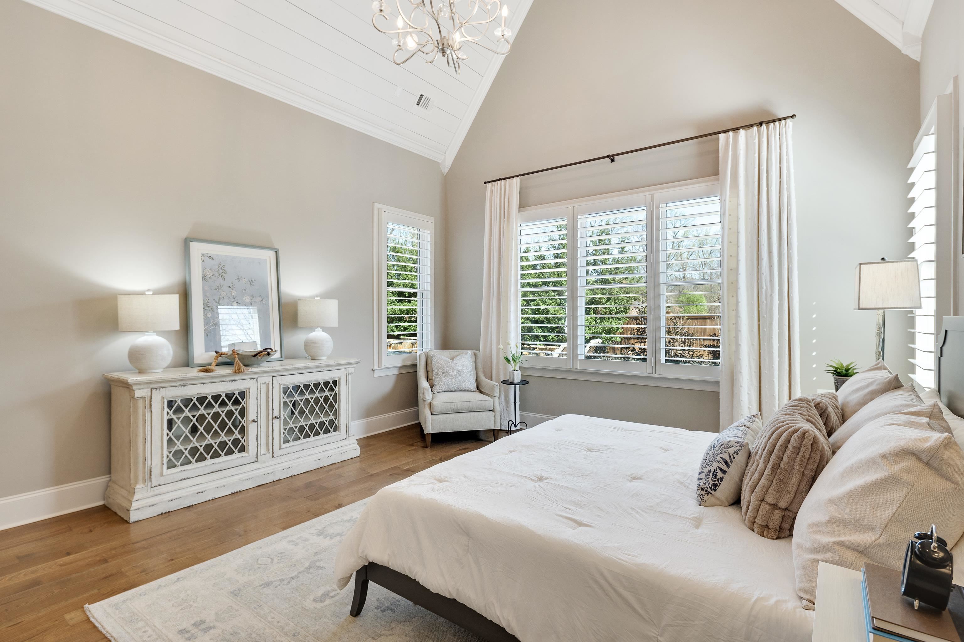 516 Lambs Brook Lane Collierville, TN 38017 - Photo 22 of 39 Bedroom featuring a chandelier, wood finished floors, lofted ceiling, and ornamental molding