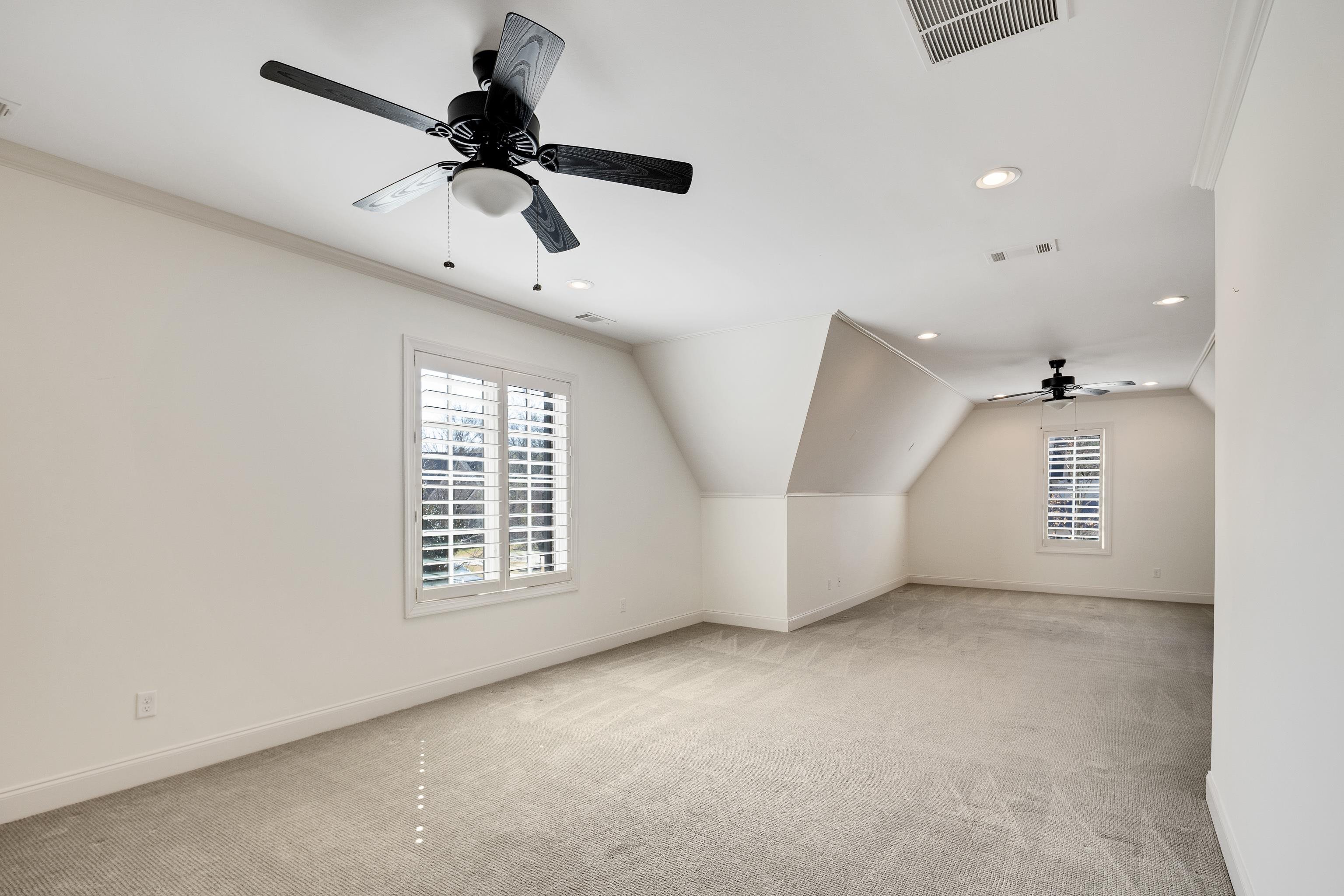 516 Lambs Brook Lane Collierville, TN 38017 - Photo 29 of 39 Bonus room with a ceiling fan, recessed lighting, vaulted ceiling, and light colored carpet