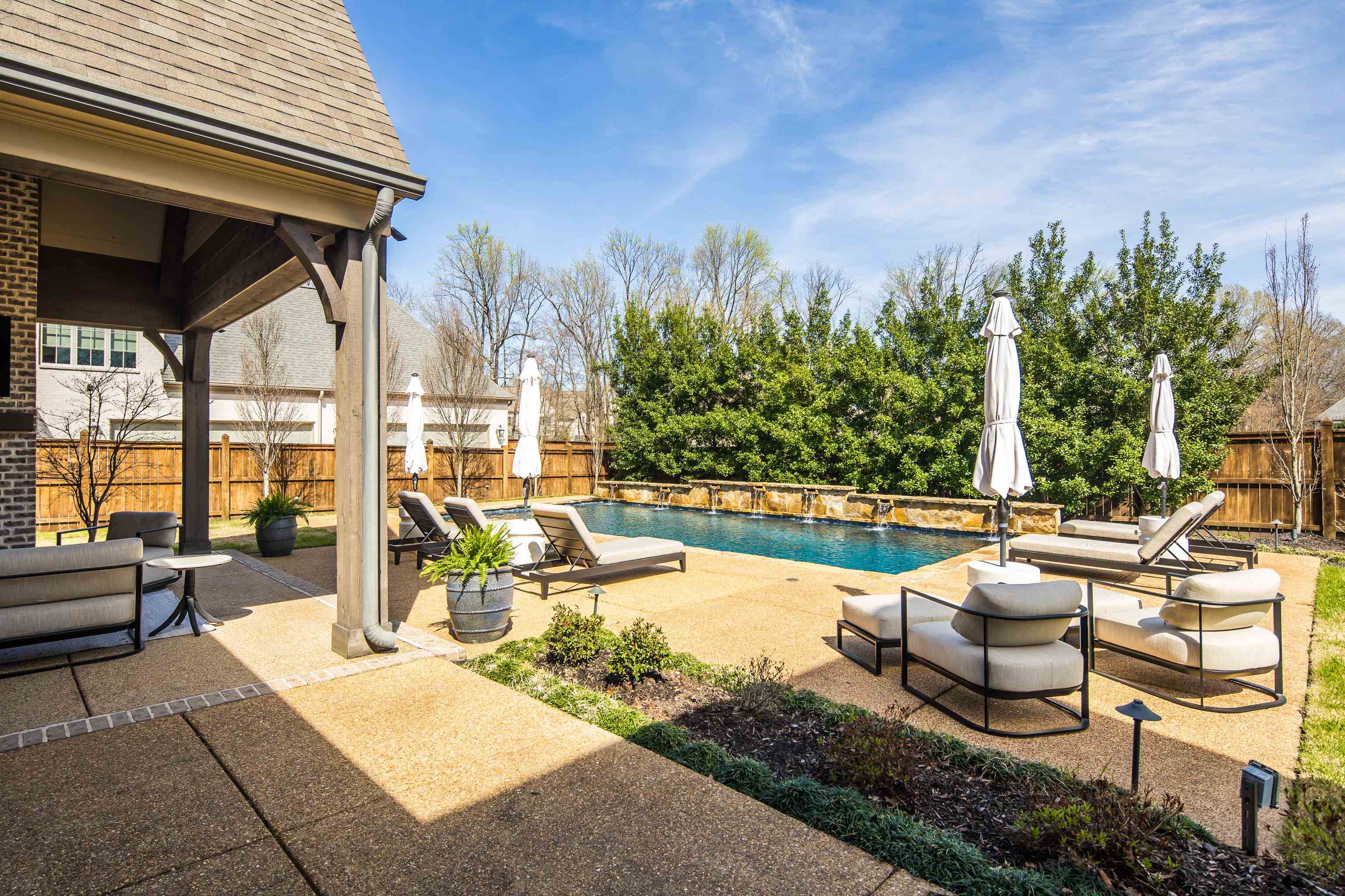 516 Lambs Brook Lane Collierville, TN 38017 - Photo 34 of 39 View of swimming pool with patio surround and a fenced backyard
