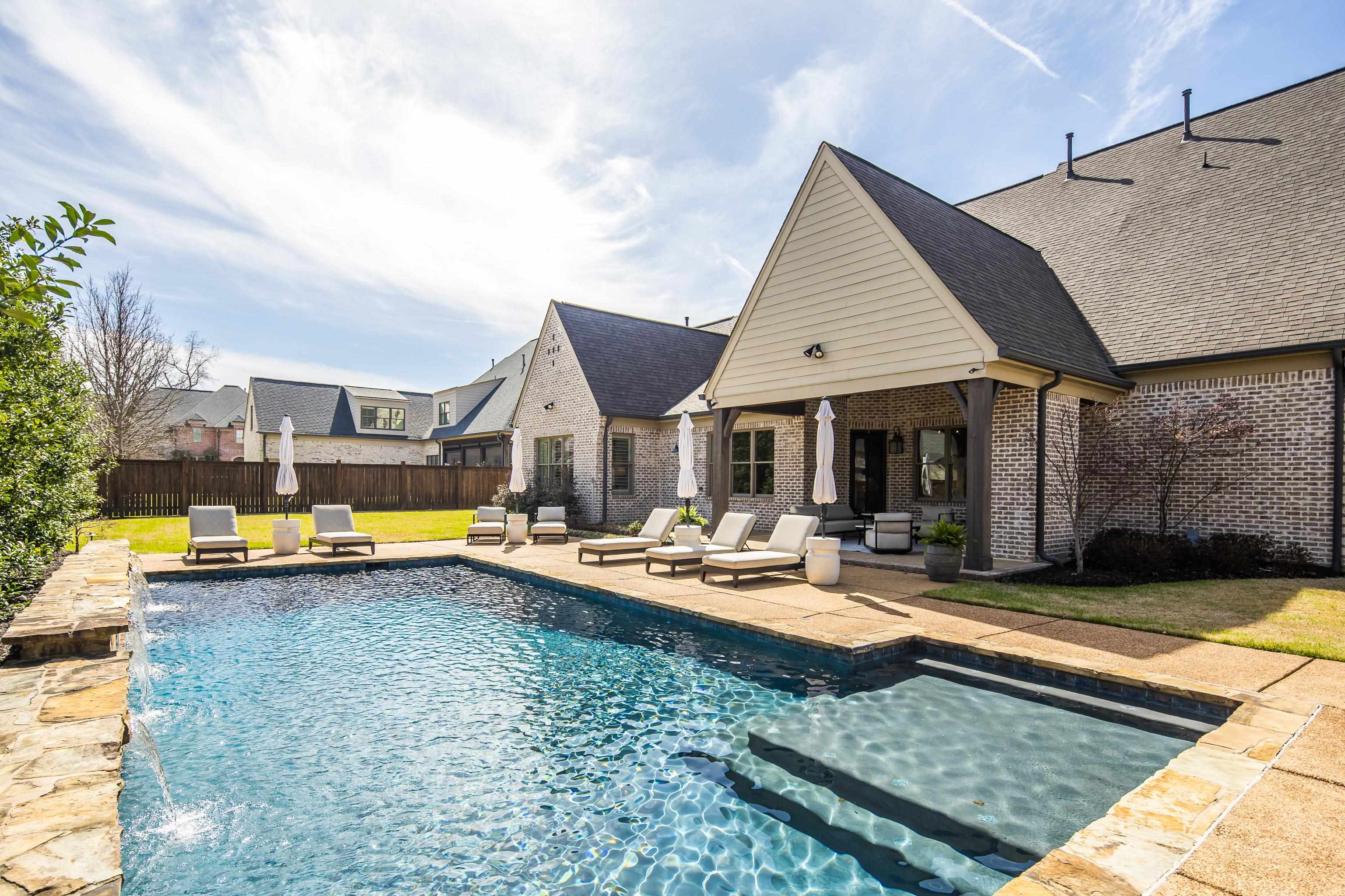 516 Lambs Brook Lane Collierville, TN 38017 - Photo 38 of 39 a view of a house with swimming pool and sitting area