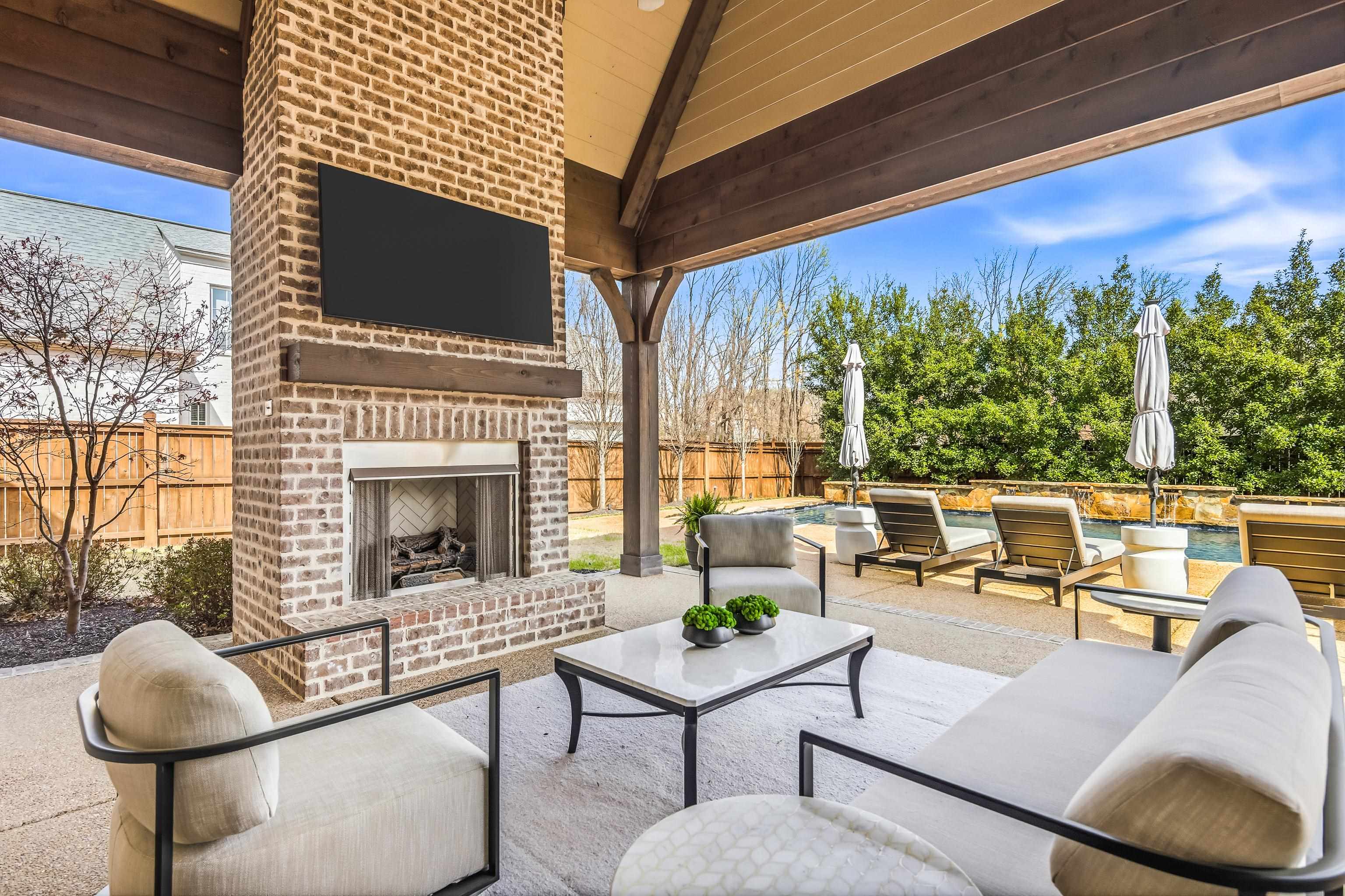 516 Lambs Brook Lane Collierville, TN 38017 - Photo 39 of 39 Fenced backyard featuring a patio and an outdoor living space with a fireplace