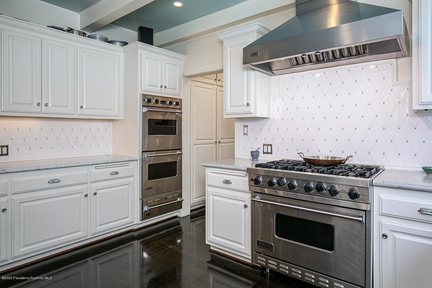 260 Hillside Road South Pasadena, CA 91030 - Photo 11 of 41 a kitchen with white cabinets and appliances