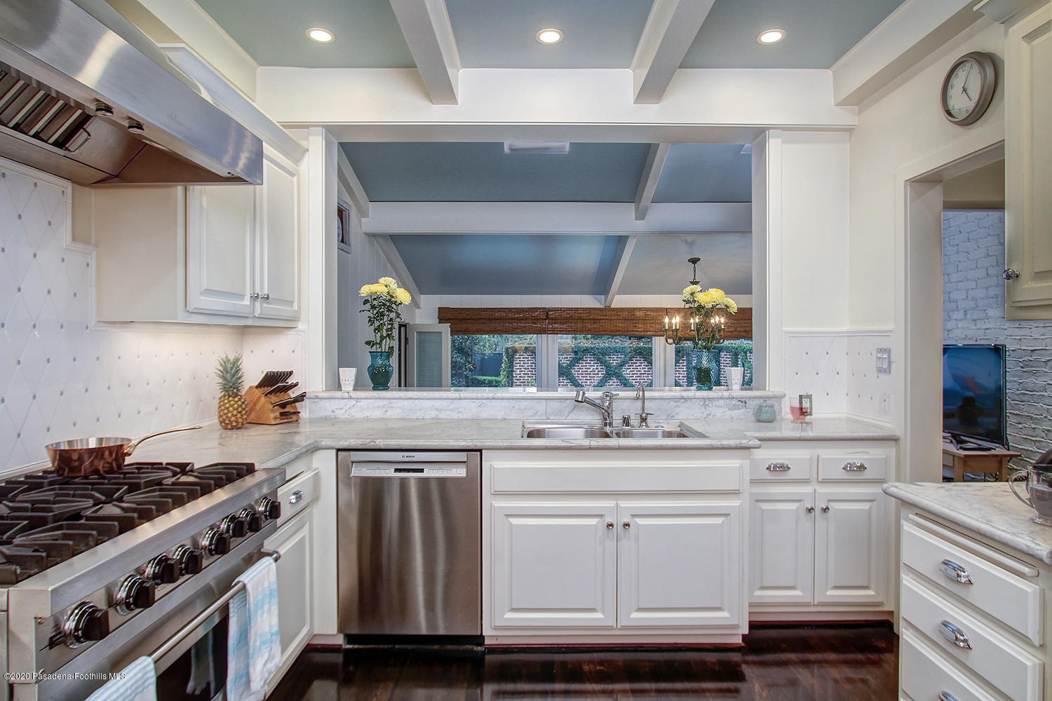 260 Hillside Road South Pasadena, CA 91030 - Photo 12 of 41 a kitchen with white cabinets and appliances