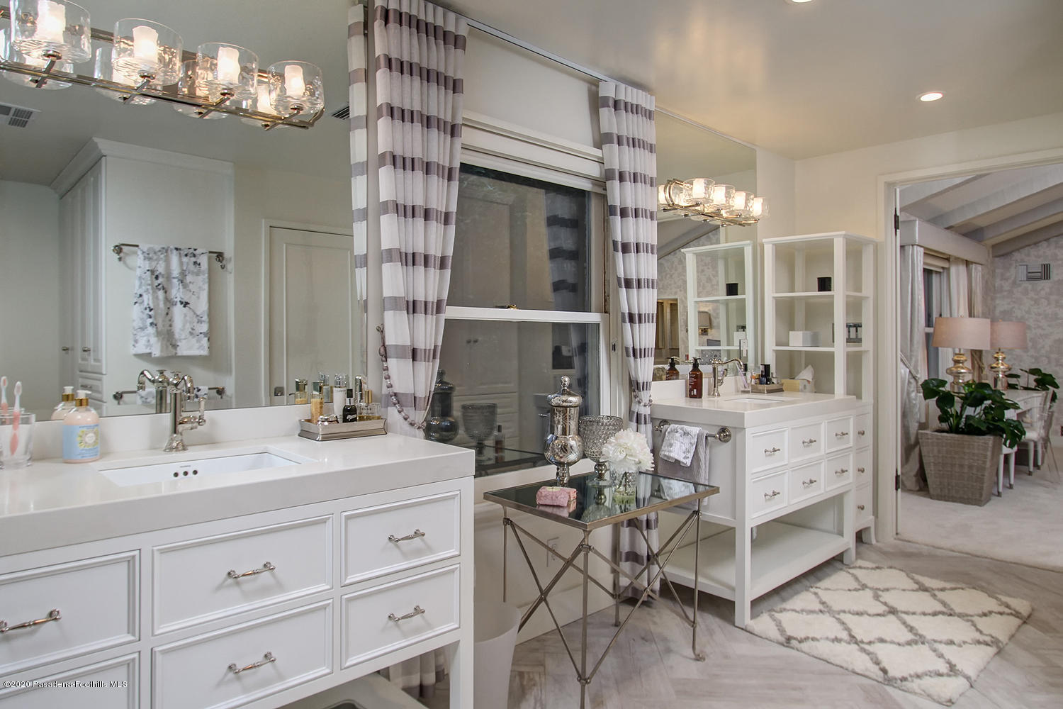 260 Hillside Road South Pasadena, CA 91030 - Photo 22 of 41 a spacious bathroom with double vanity a mirror a chandelier and a shower