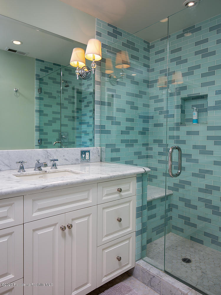 260 Hillside Road South Pasadena, CA 91030 - Photo 27 of 41 a bathroom with a shower sink and mirror