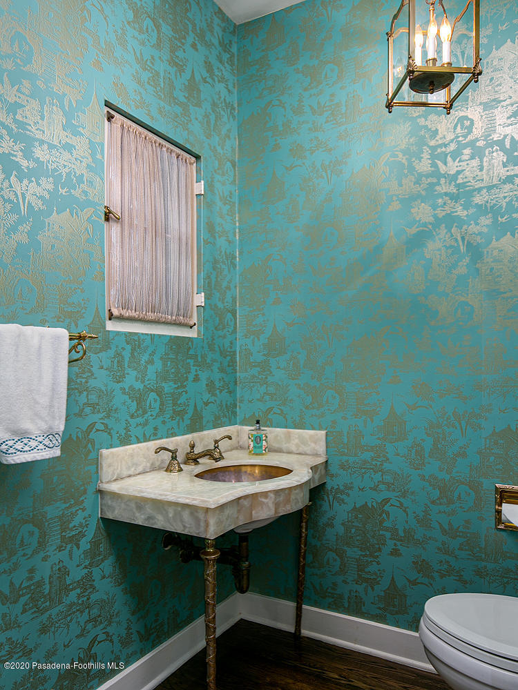 260 Hillside Road South Pasadena, CA 91030 - Photo 9 of 41 a view of a bathroom with a sink and a mirror