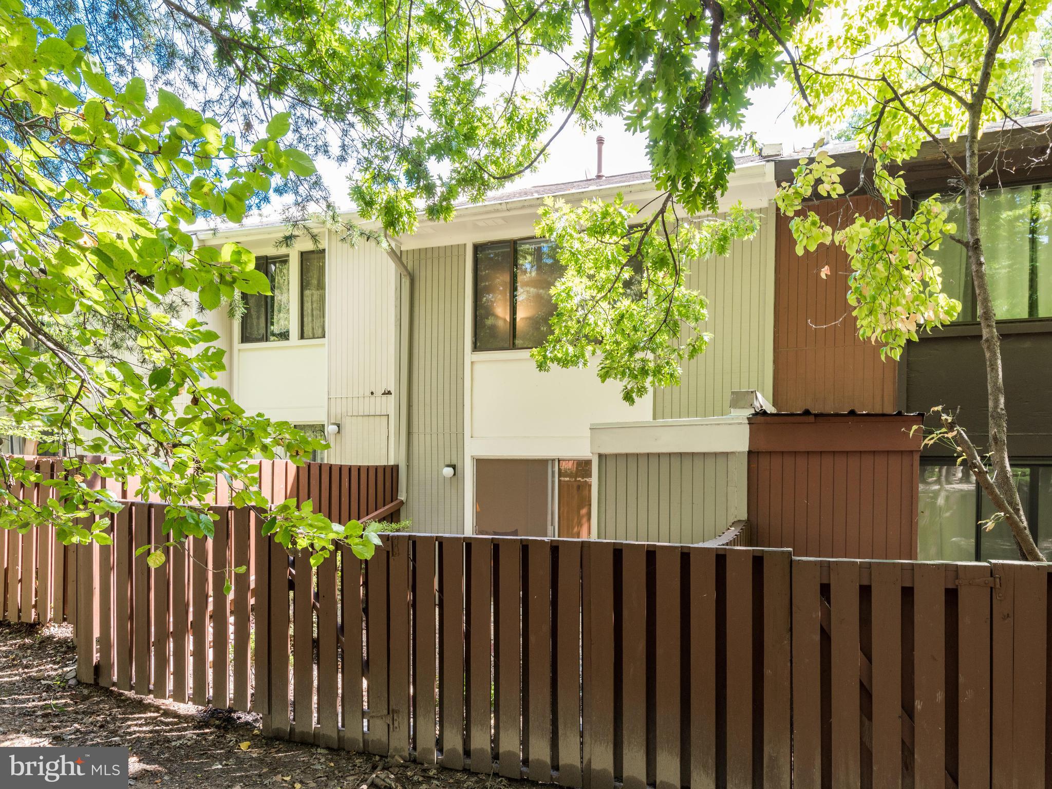 2255 Southgate Square Reston, VA 20191 - Photo 19 of 19 Gated Privacy Fence to Common Wooded Area