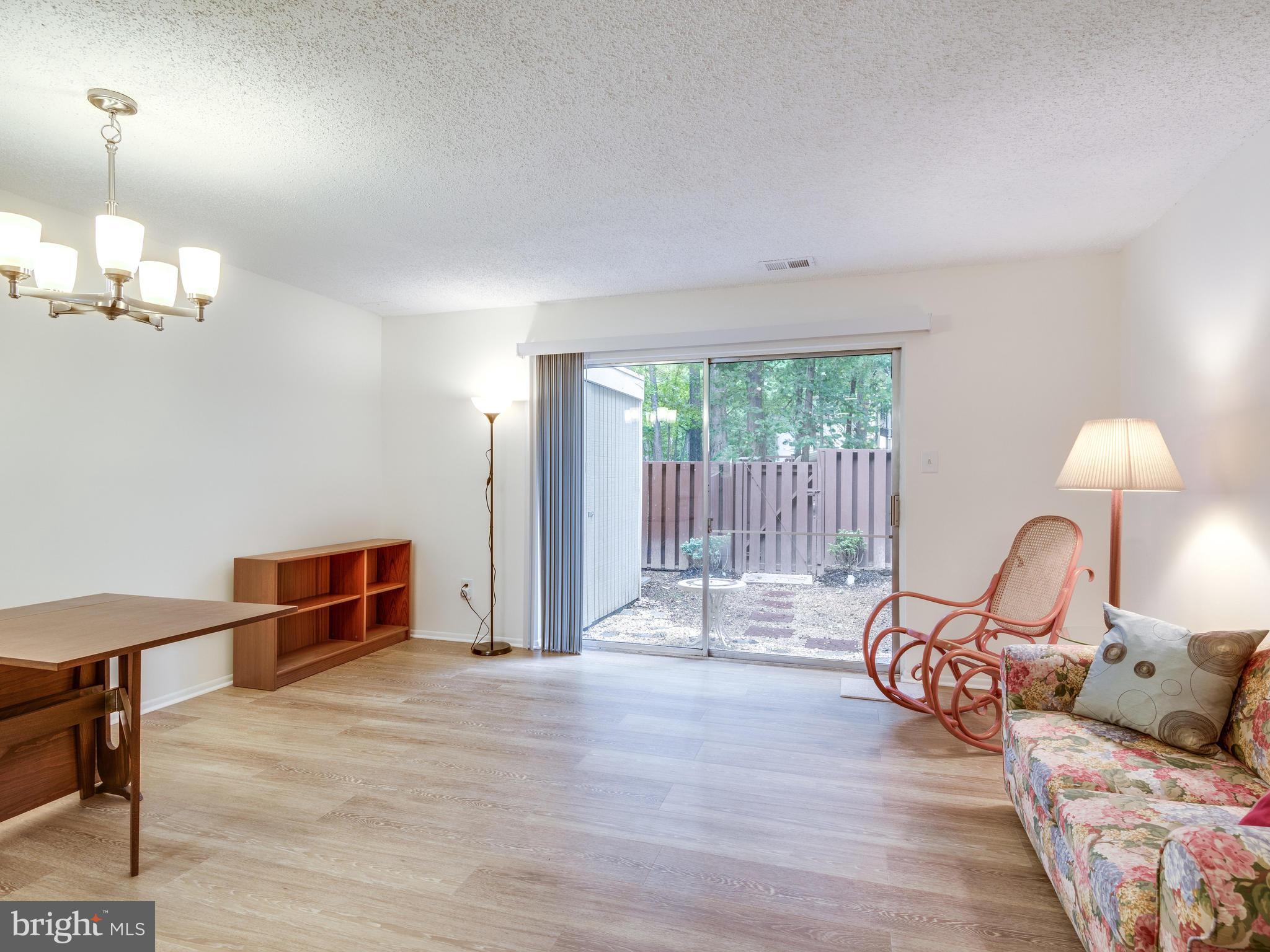 2255 Southgate Square Reston, VA 20191 - Photo 9 of 19 Bright Living Room with 8' Sliding Glass Door